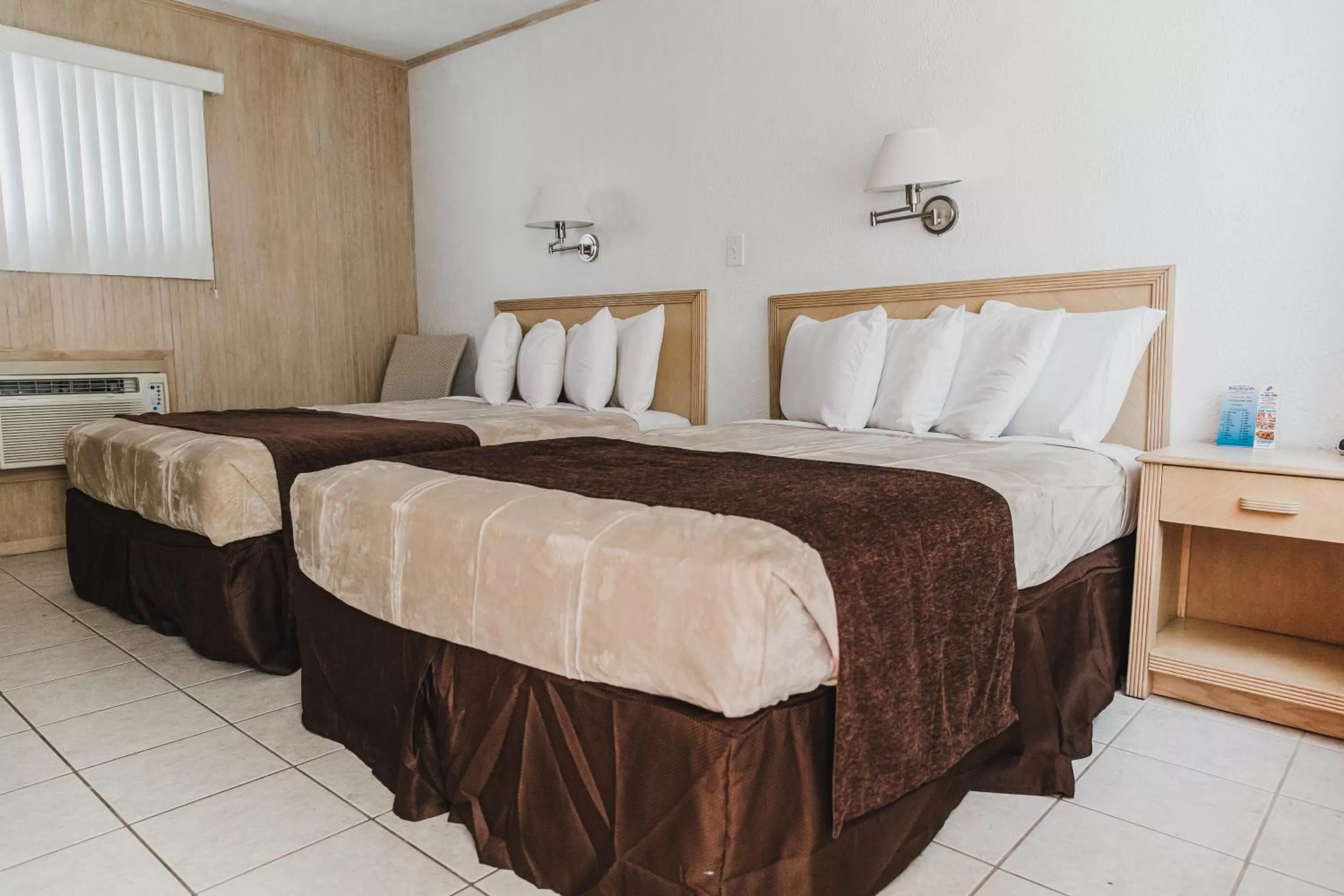 Bed in Heart of Wildwood Boardwalk Motel