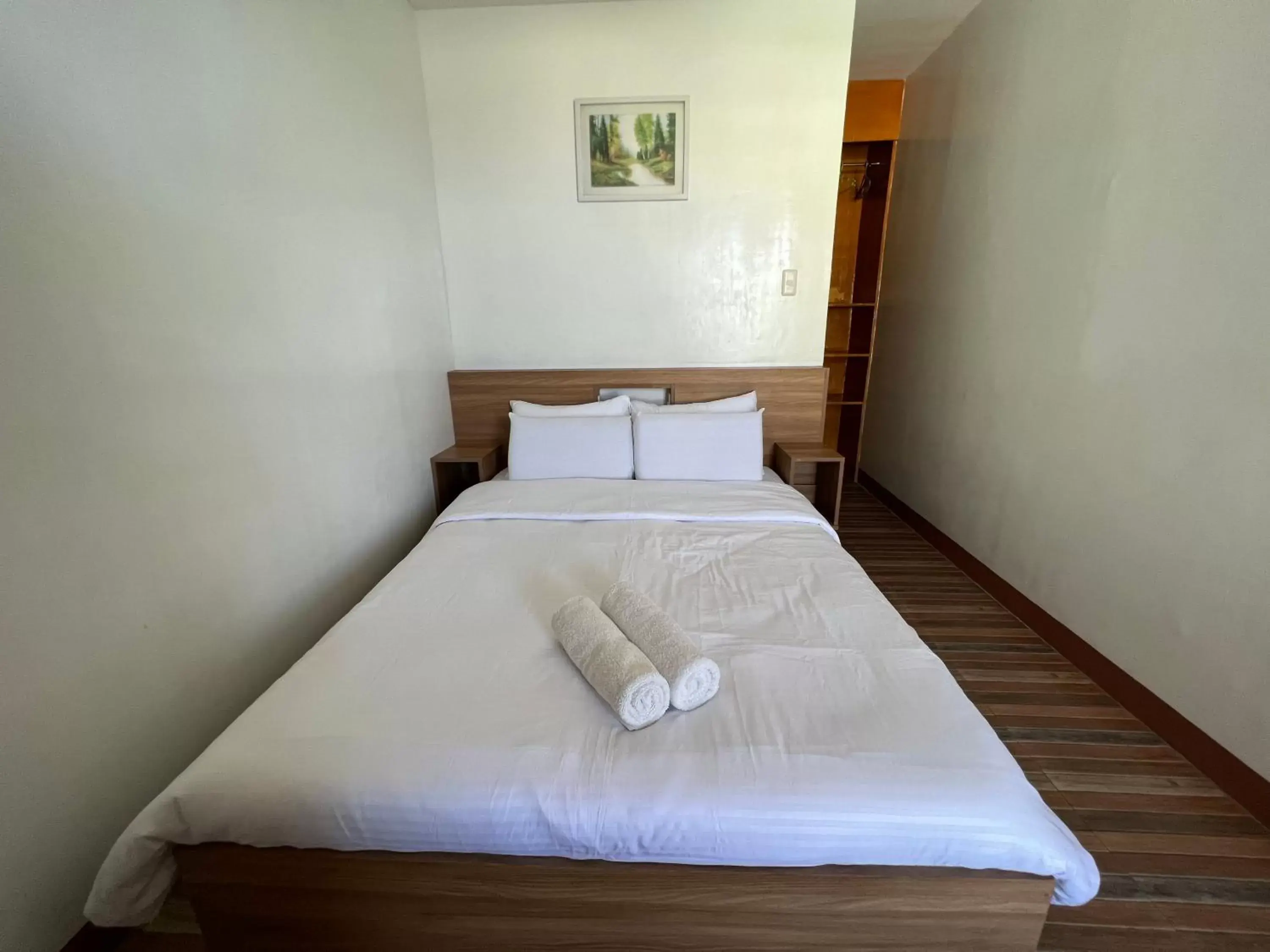 Bed in GingGing Hotel And Resort