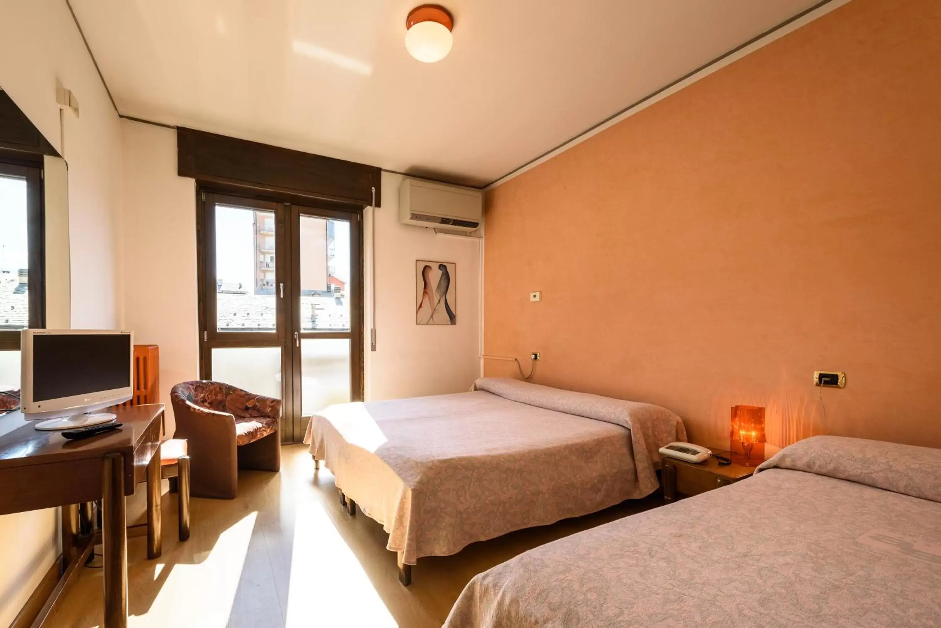 Triple Room with Balcony in Hotel Schenatti