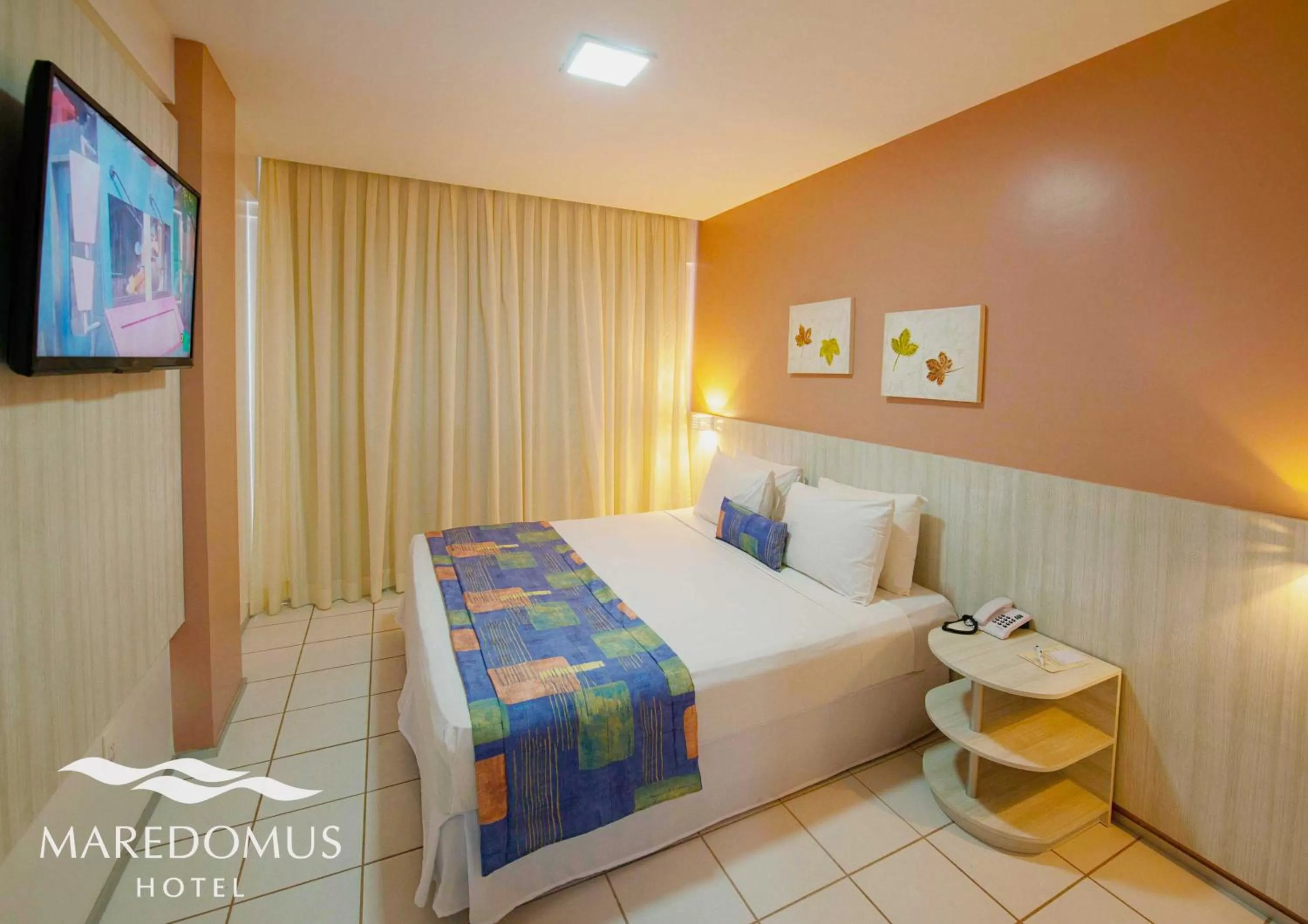 Bed in Maredomus Hotel