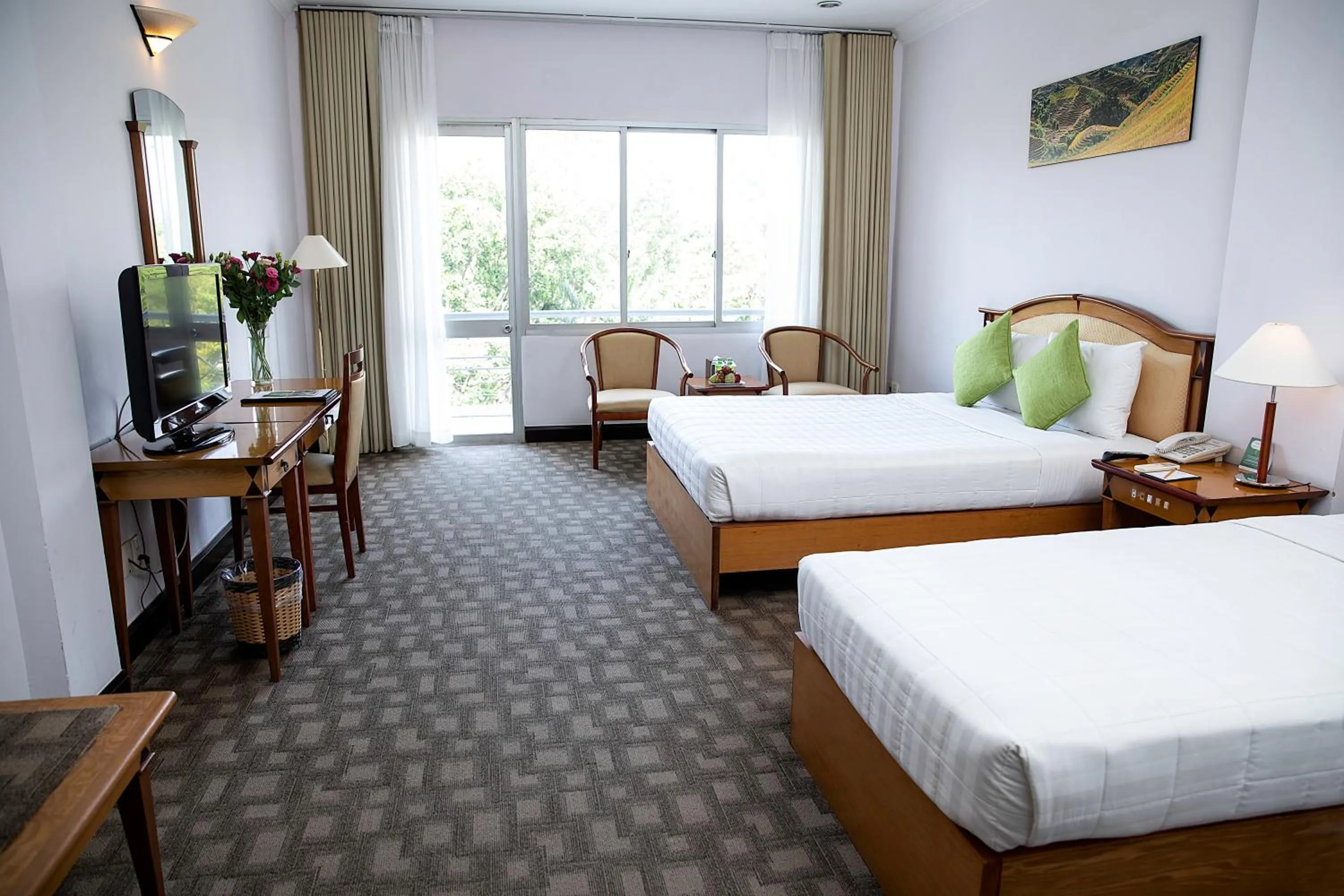 Bed in Liberty Hotel Saigon Parkview