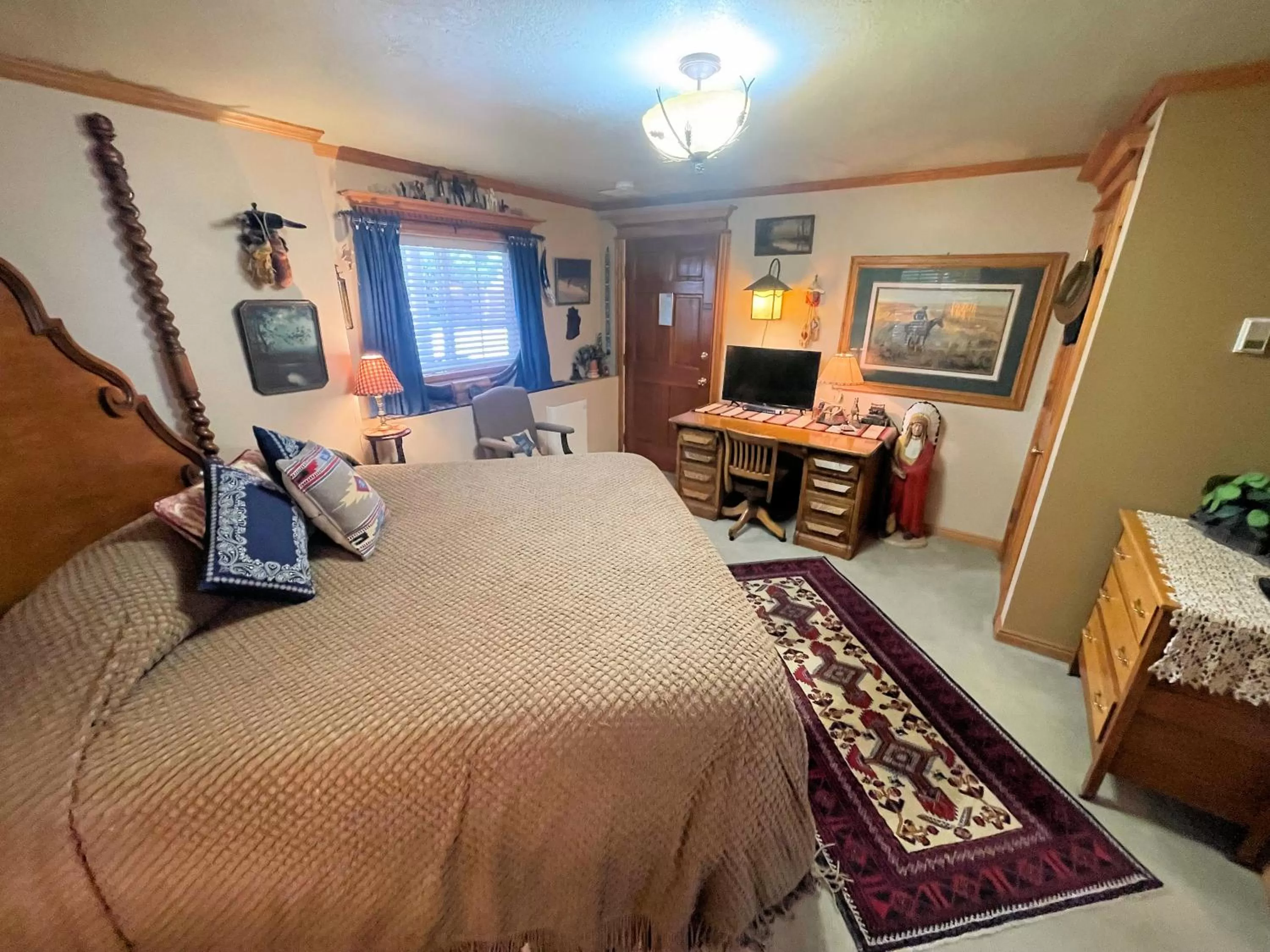 Bed, Seating Area in Big Yellow Inn