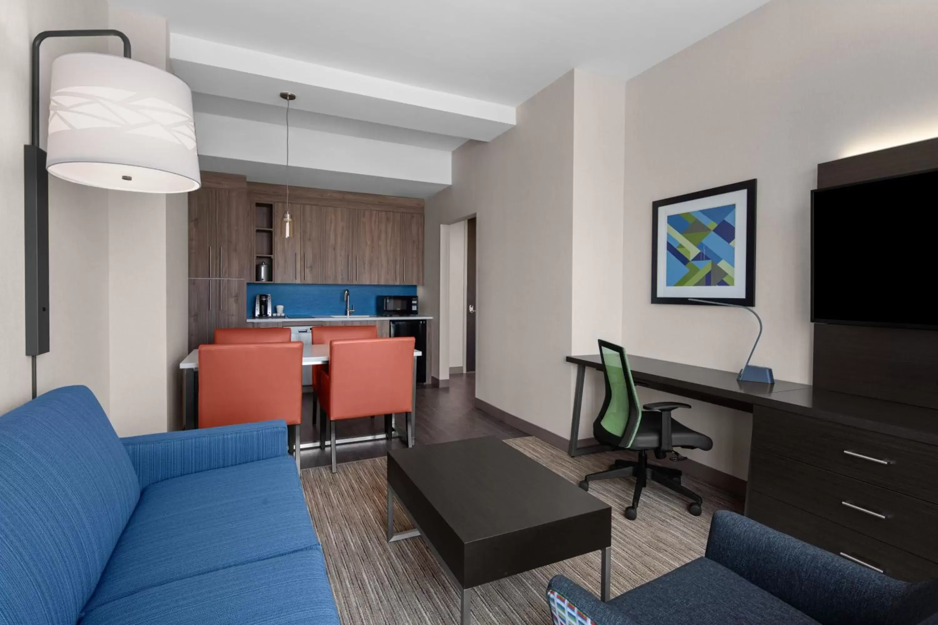 Bedroom, Seating Area in Holiday Inn Express & Suites - Woodside Queens NYC, an IHG Hotel
