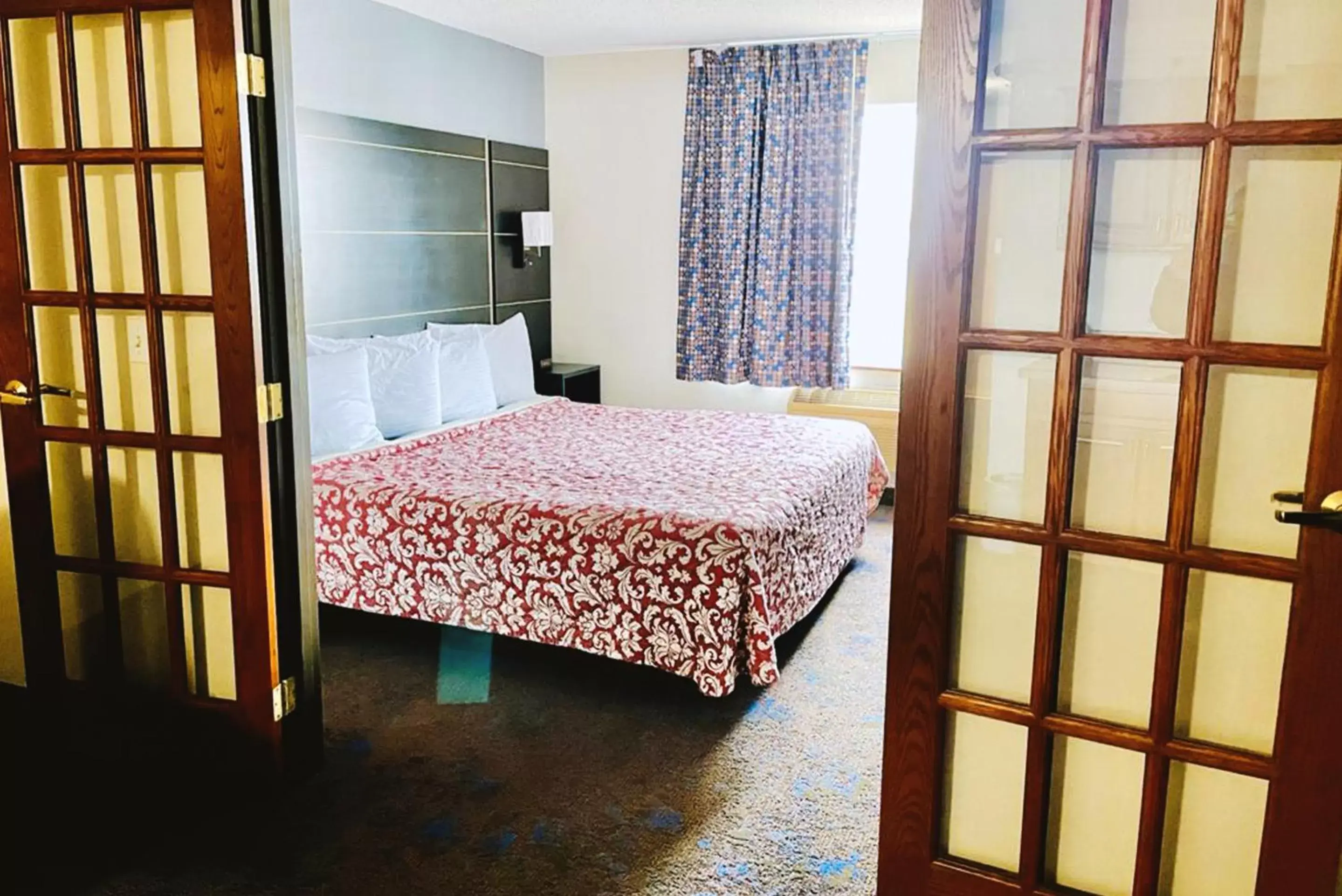 Bed in Coratel Inn & Suites by Jasper Northfield Bed in Coratel Inn & Suites by Jasper Northfield