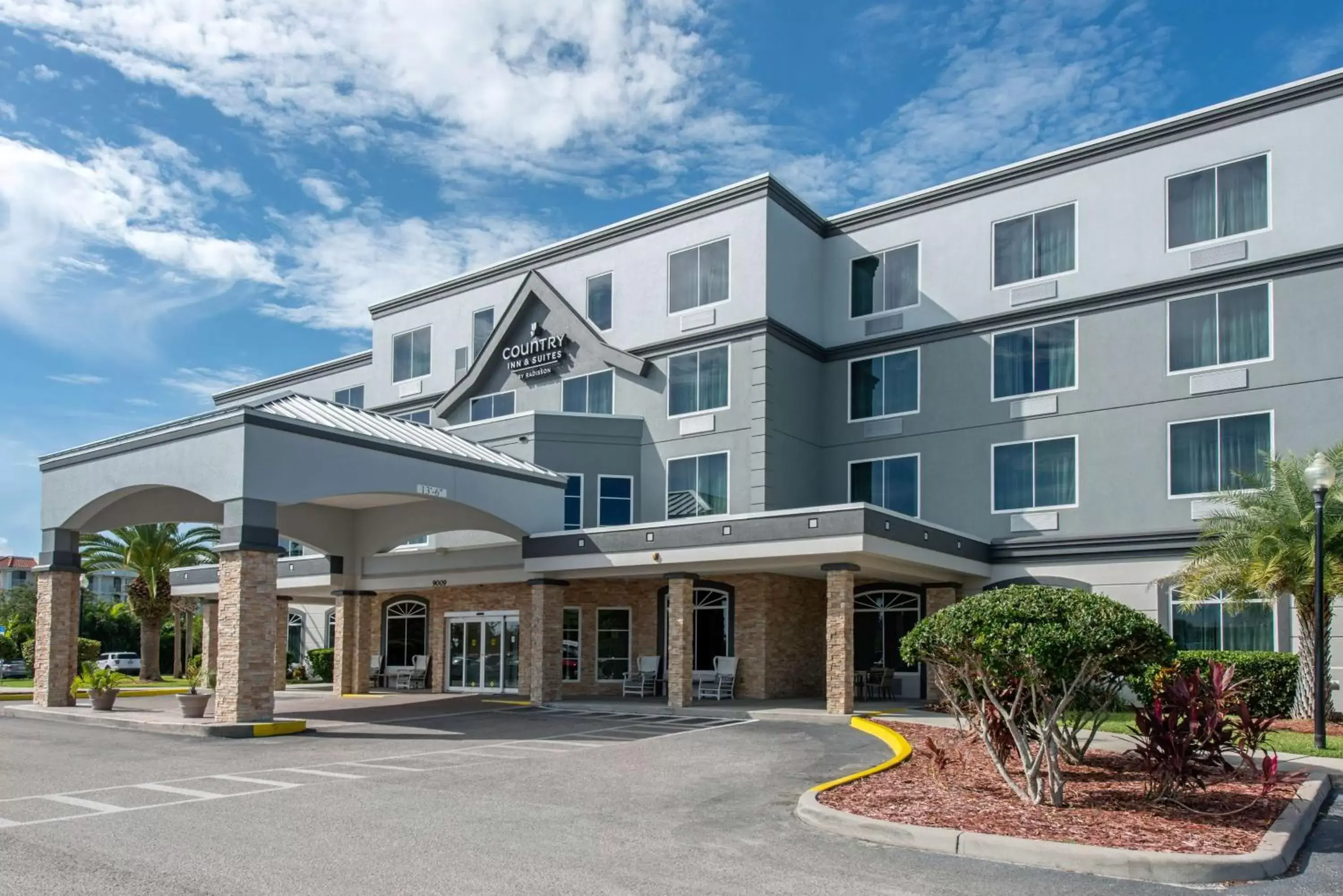 Property Building in Country Inn & Suites by Radisson, Port Canaveral, FL