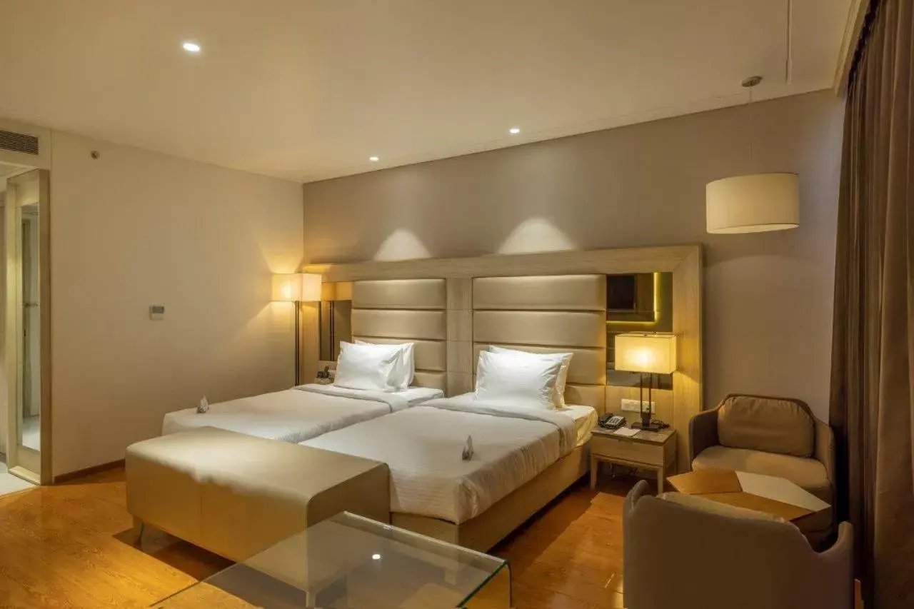 Bedroom, Bed in Sarovar Portico Morbi