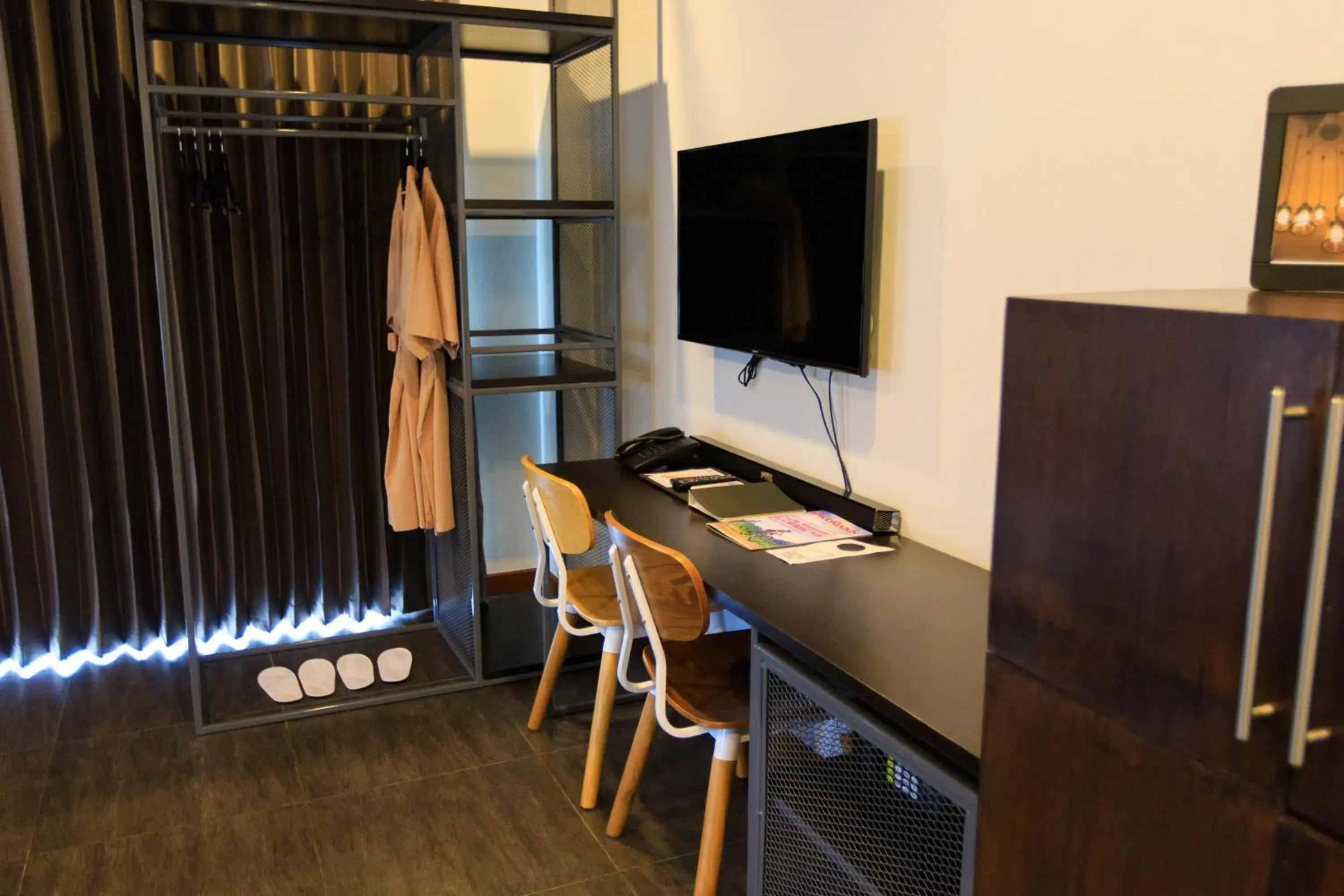 Photo of the whole room, TV/Entertainment Center in Wealth Boutique Hotel Chiang Mai