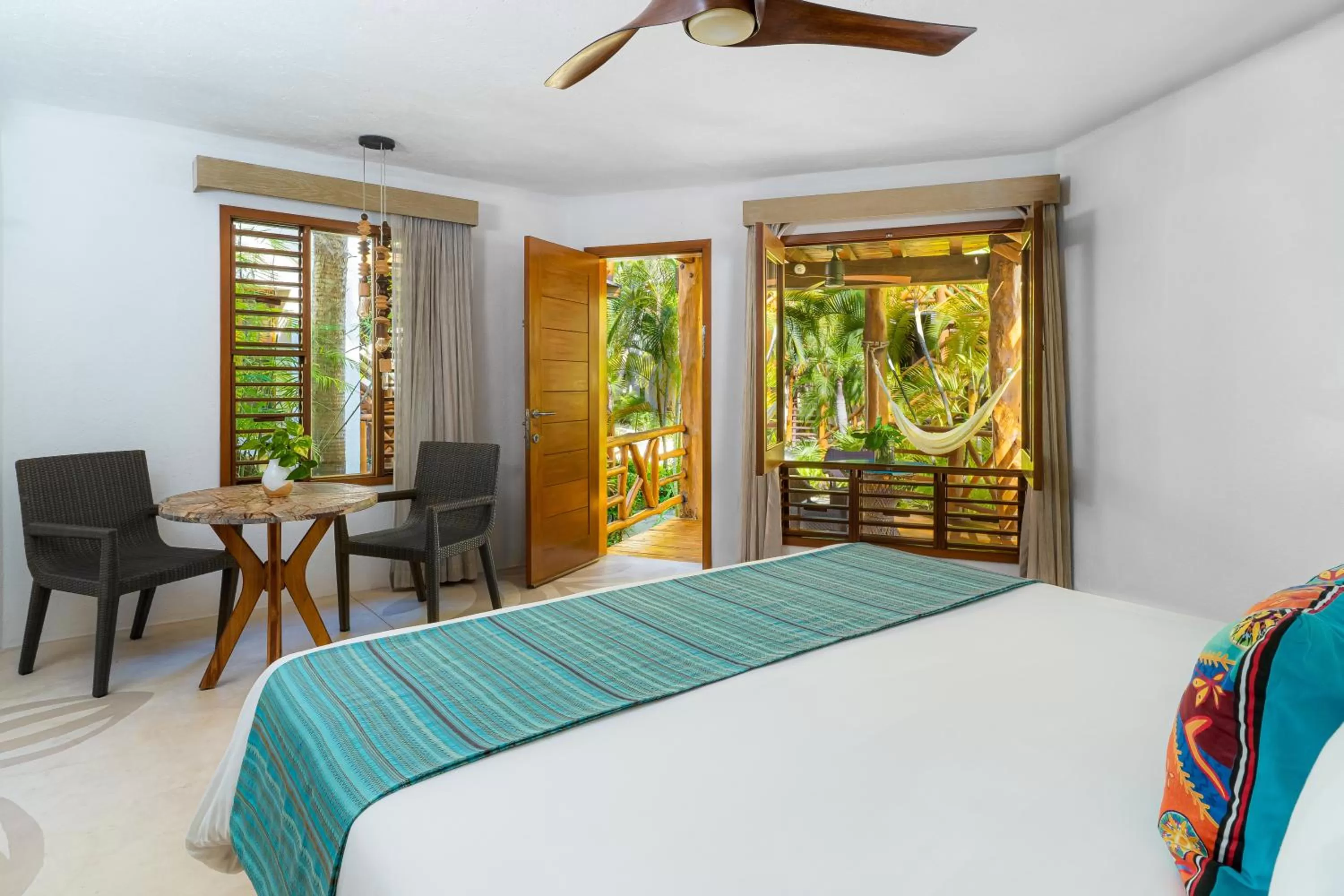 Bed in Mahekal Beach Front Resort & Spa