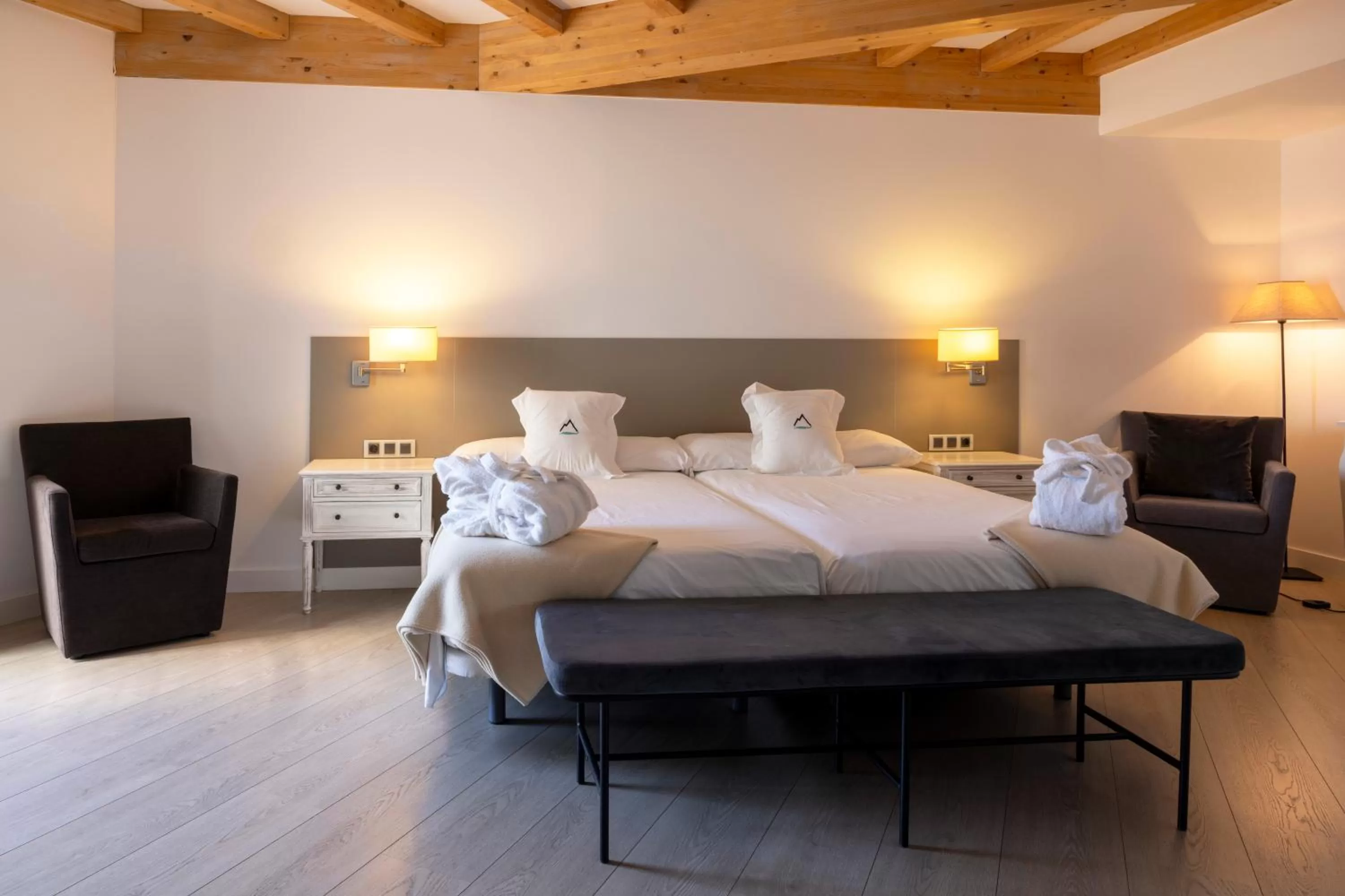 Bed in The Rock Suites & Spa