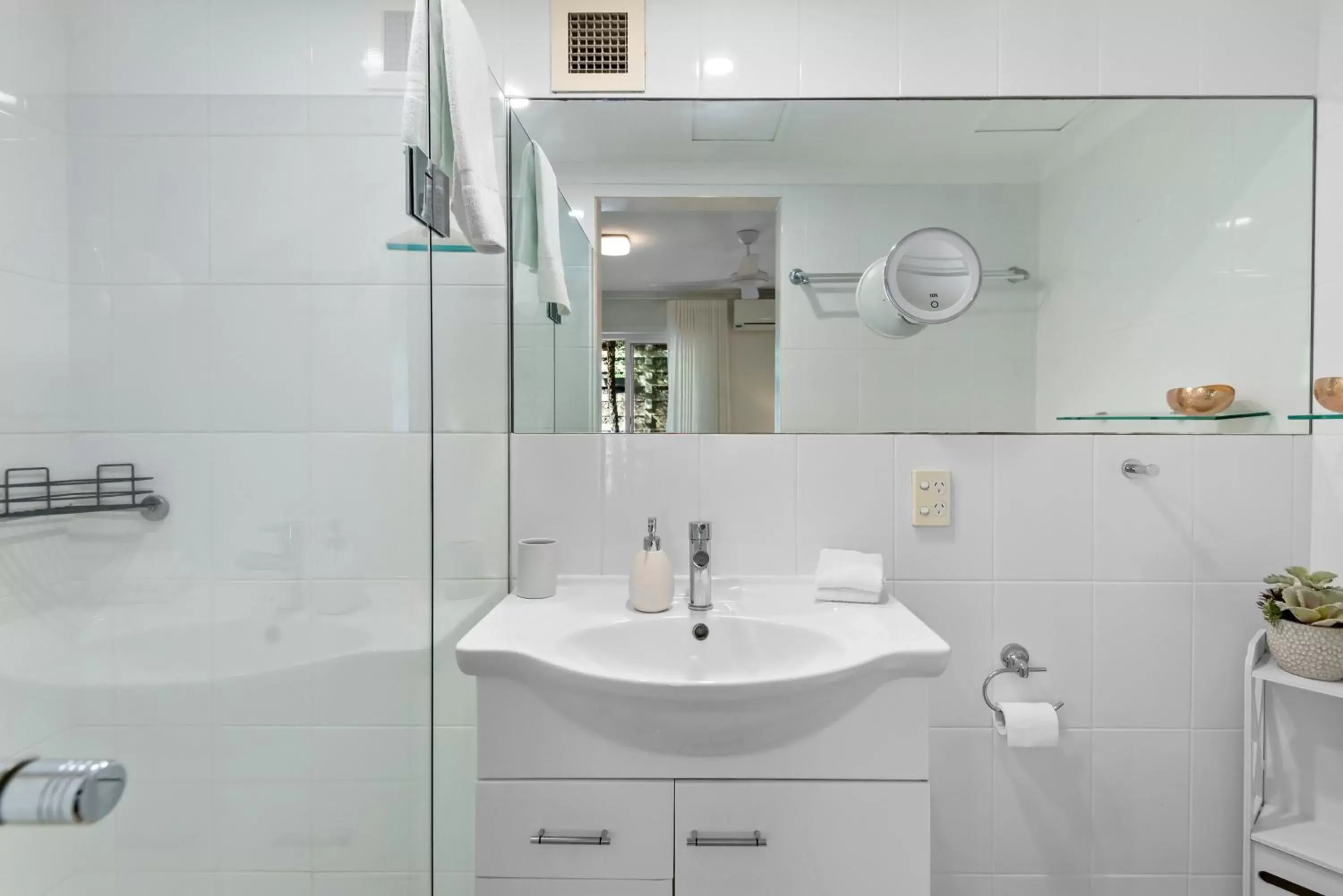 Shower, Bathroom in The Oasis Apartments and Treetop Houses