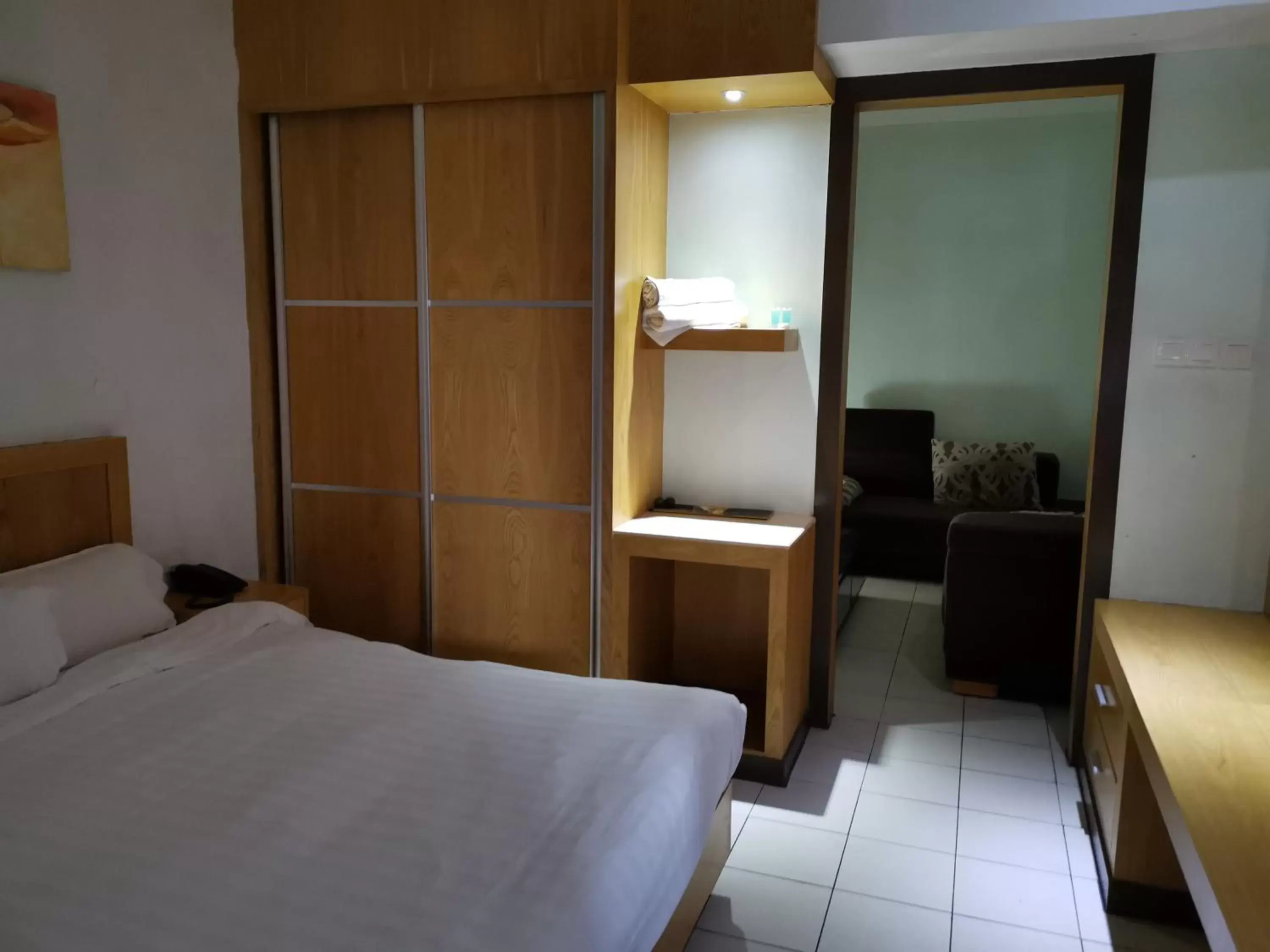 Photo of the whole room, Bed in Fratini's Hotel Labuan