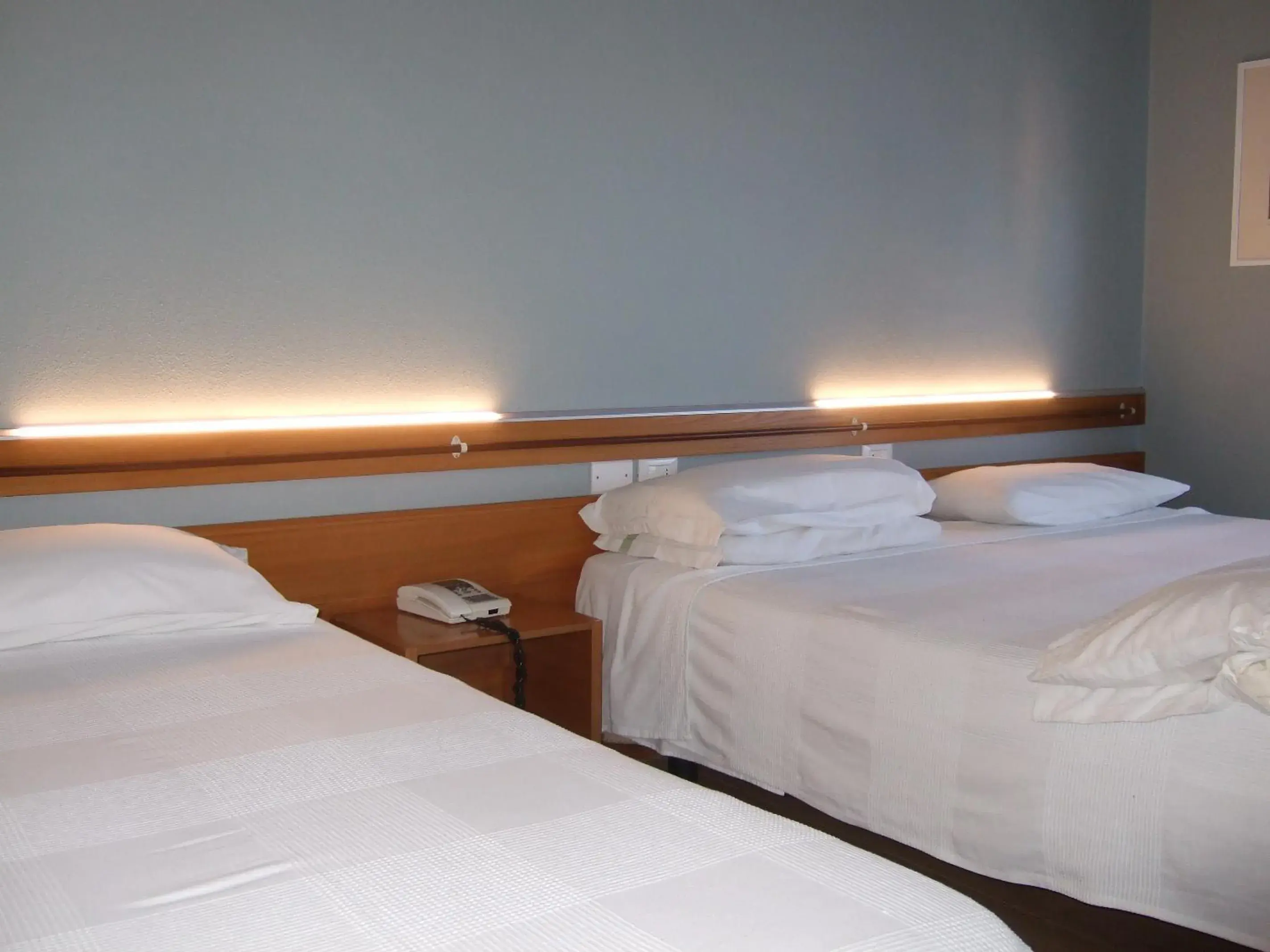 Bed in Hotel Canturio