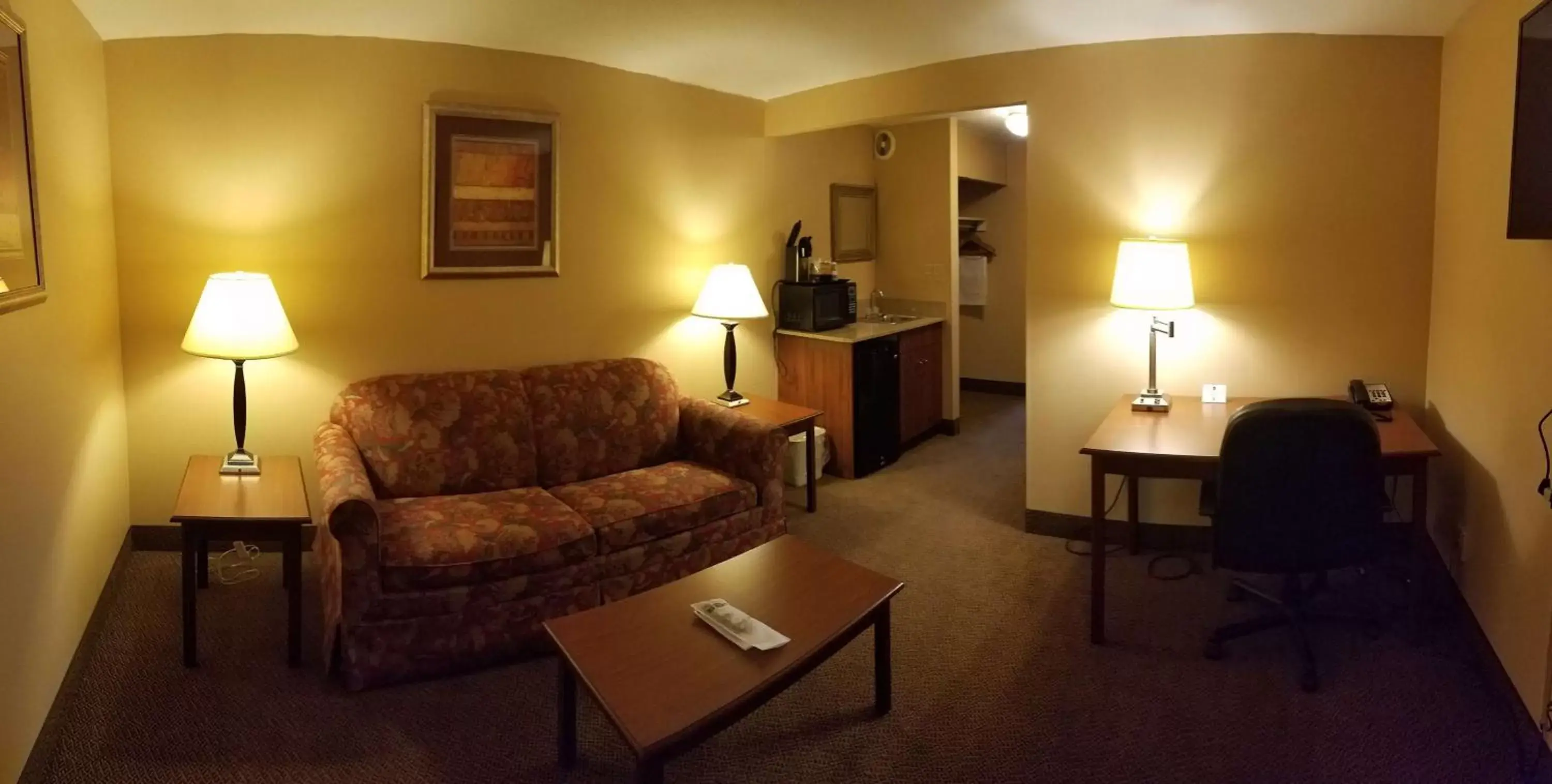 Photo of the whole room, Seating Area in SureStay Plus Hotel by Best Western Black River Falls