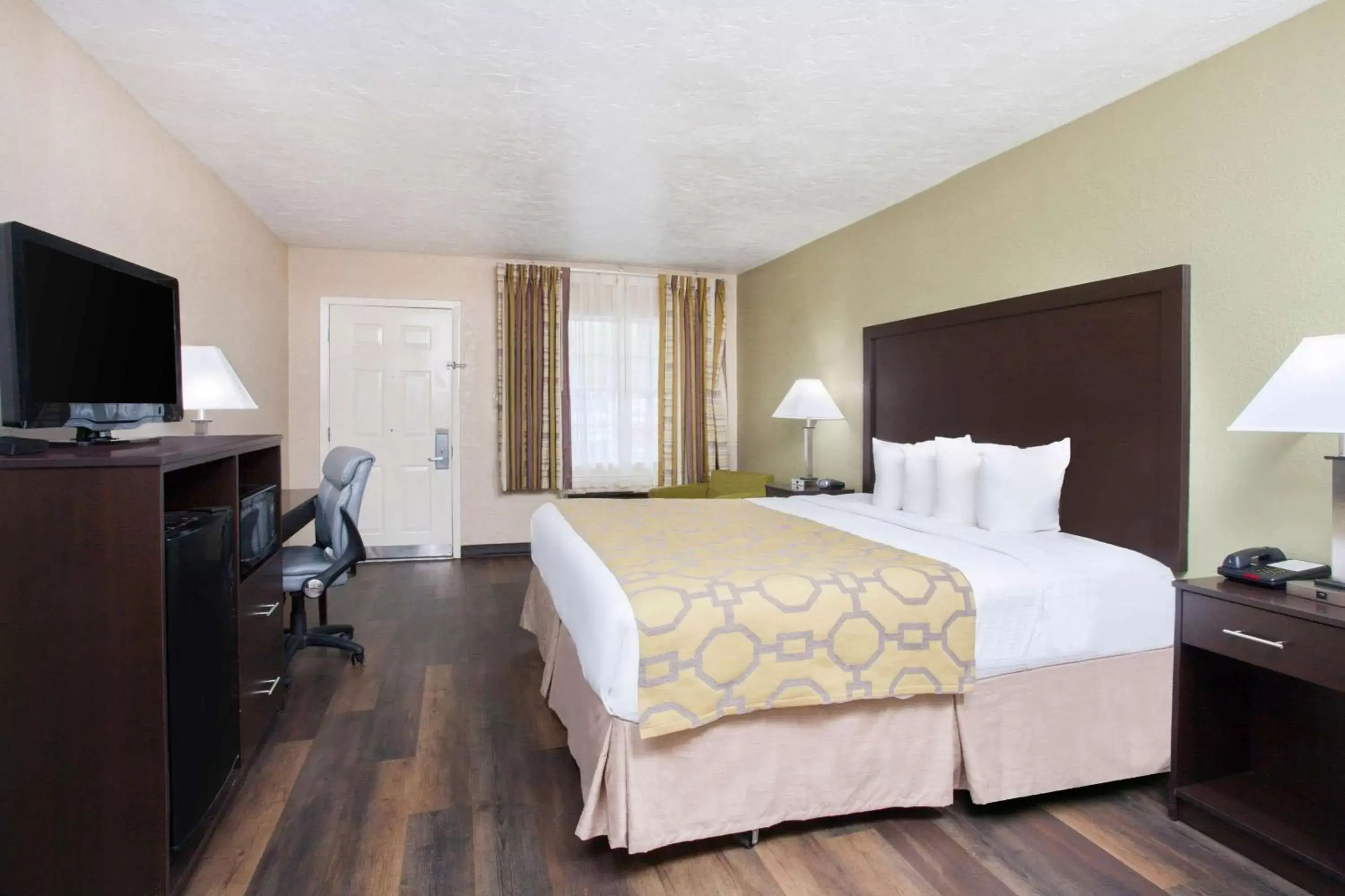 Photo of the whole room, Bed in Baymont by Wyndham Lake City