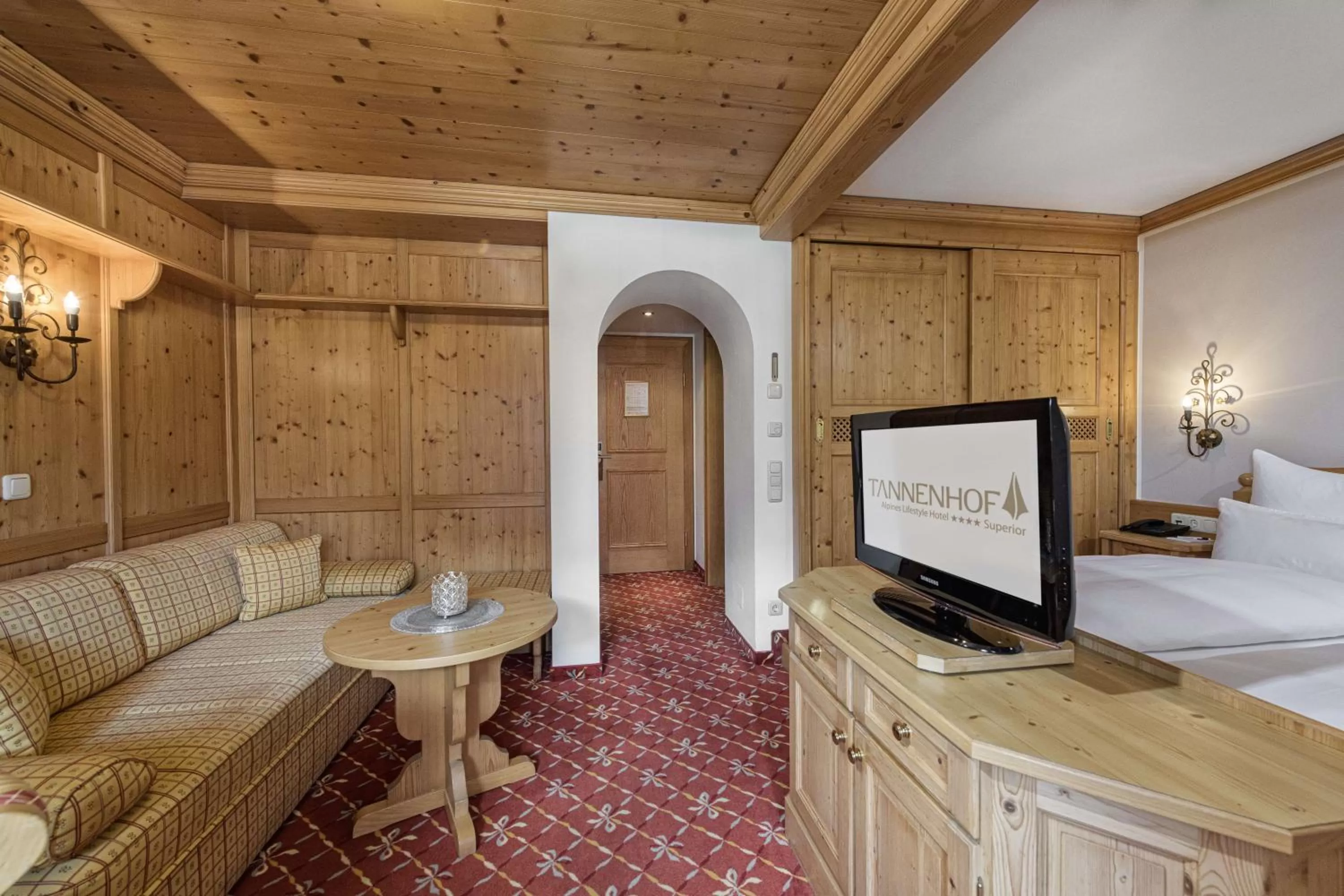 Photo of the whole room, Bed in Alpines Lifestyle Hotel Tannenhof