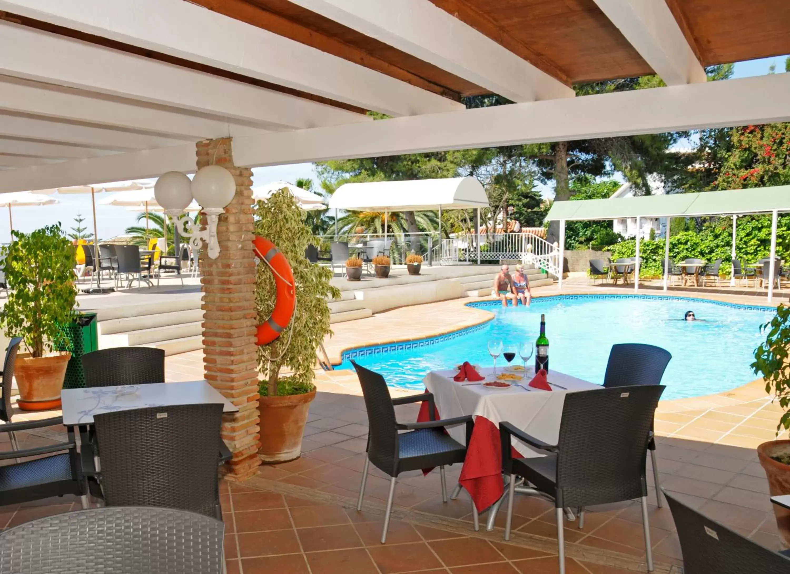 Restaurant/places to eat, Swimming Pool in Hotel Nerja Club Spa by Dorobe