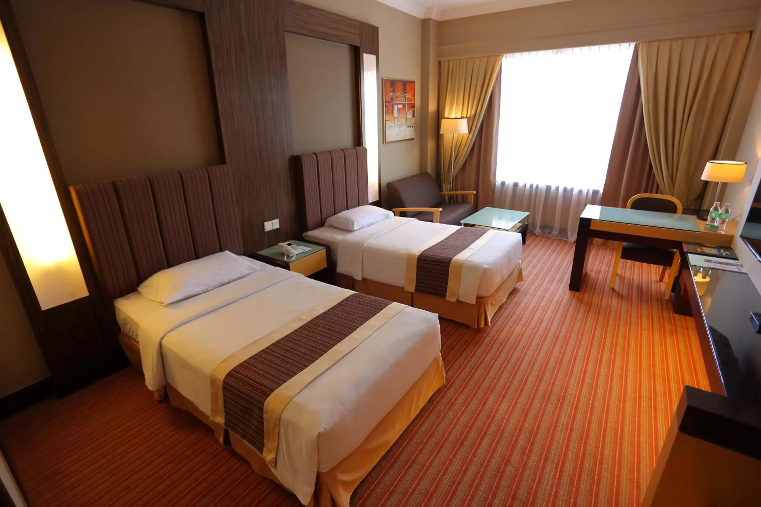 Bed in Dynasty Hotel Miri