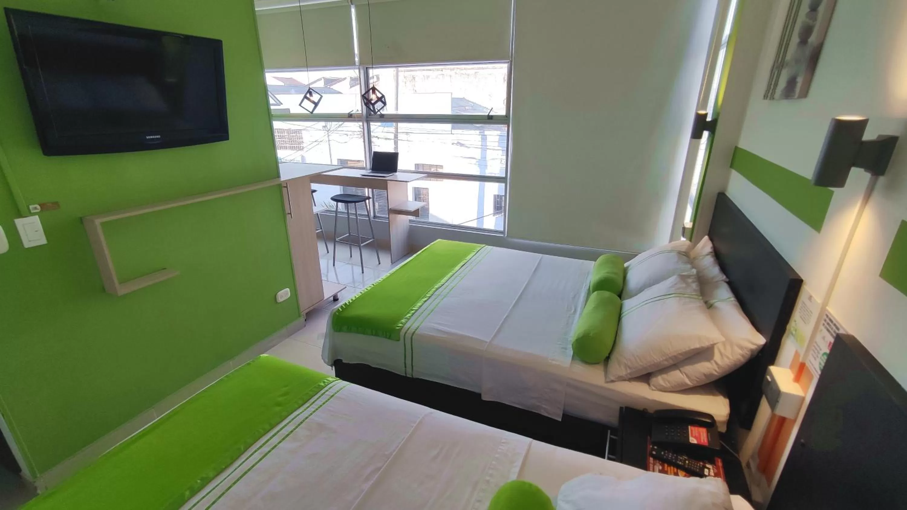 Bed in HOTEL COLOURS Cali