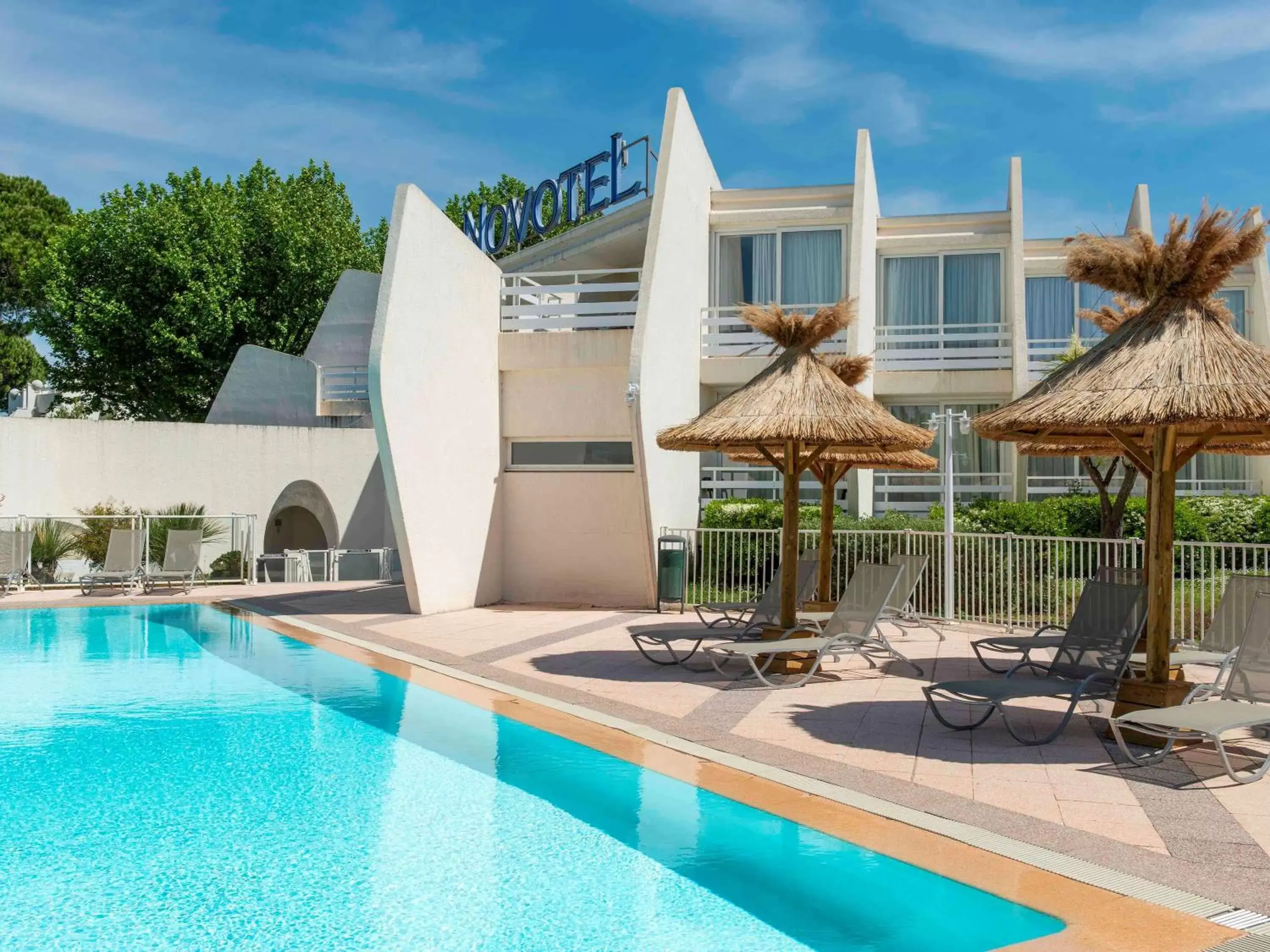 Property building, Swimming Pool in Novotel La Grande Motte Golf