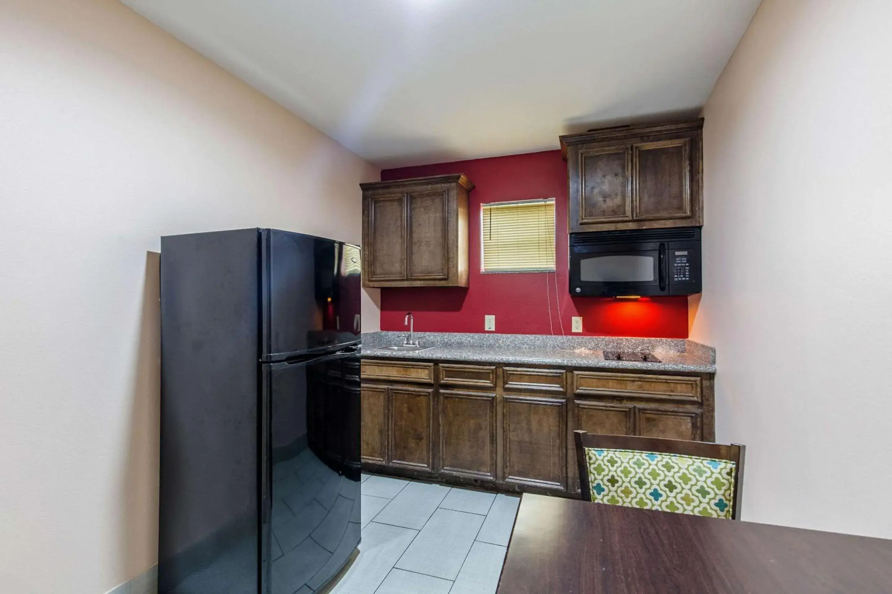 Photo of the whole room, Kitchen/Kitchenette in Quality Inn & Suites