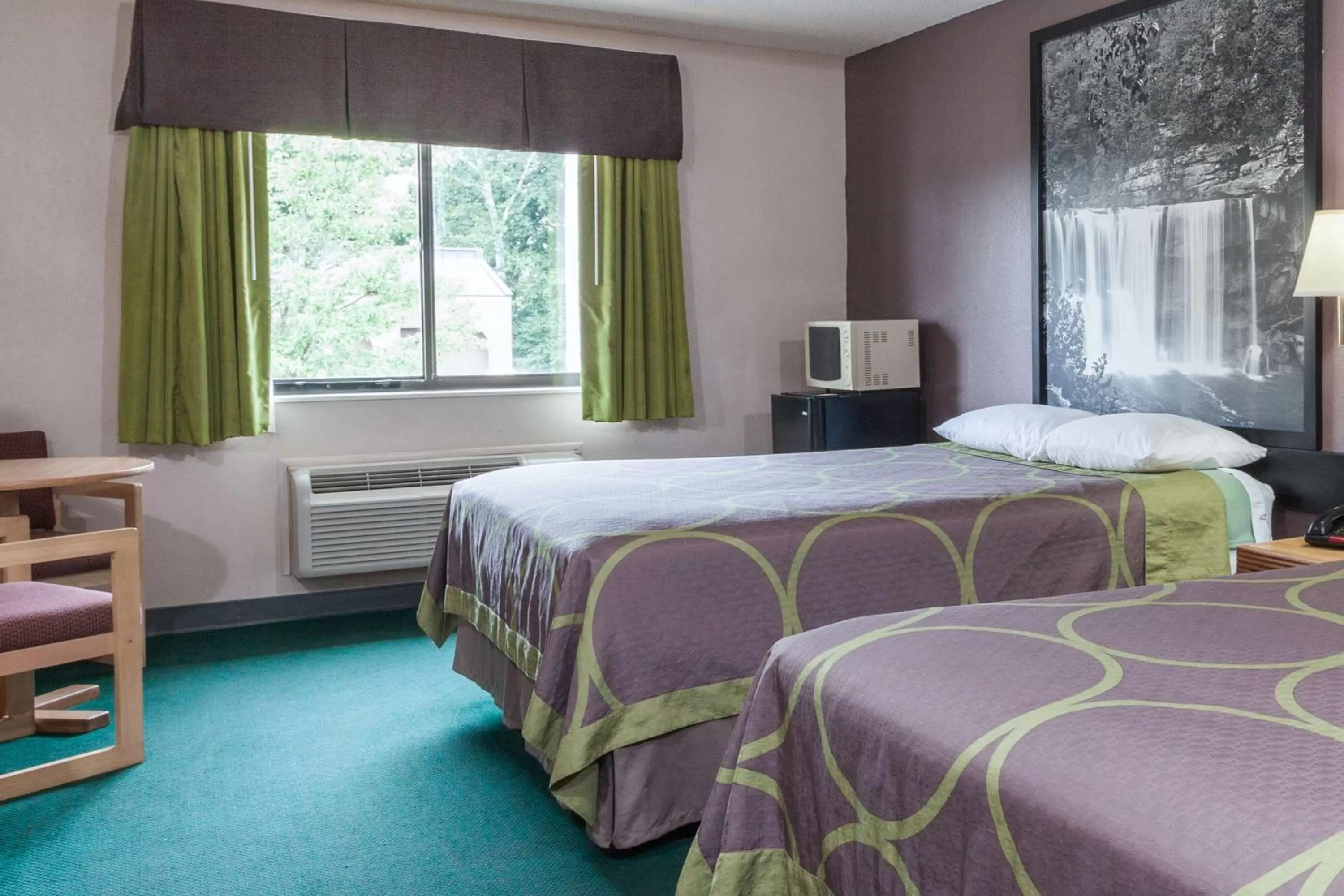 Bed in Super 8 by Wyndham Carrollton