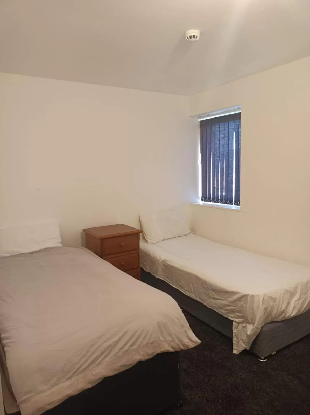 Bedroom, Bed in OYO Victoria Apartments