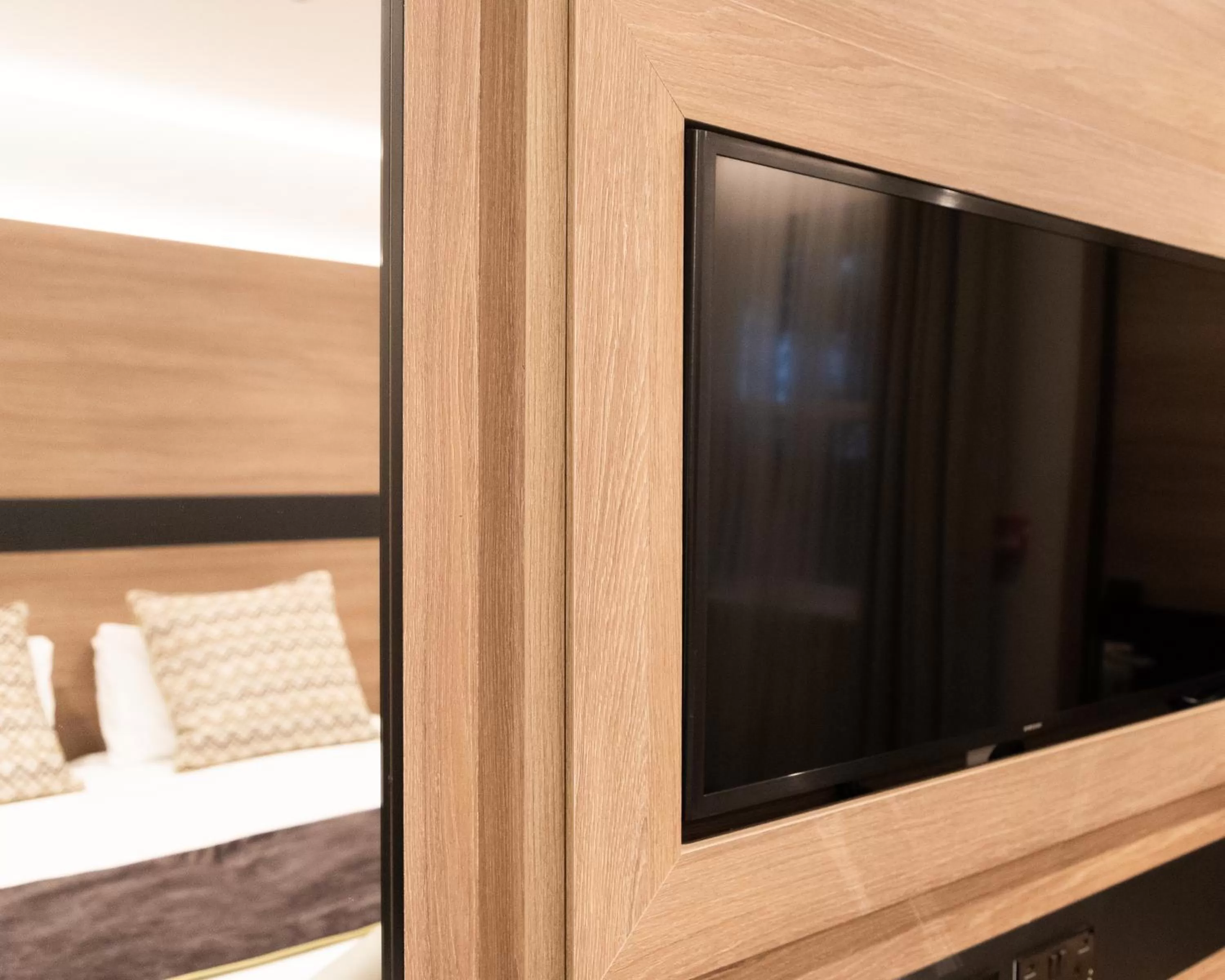 Bed in Merit Kensington Hotel