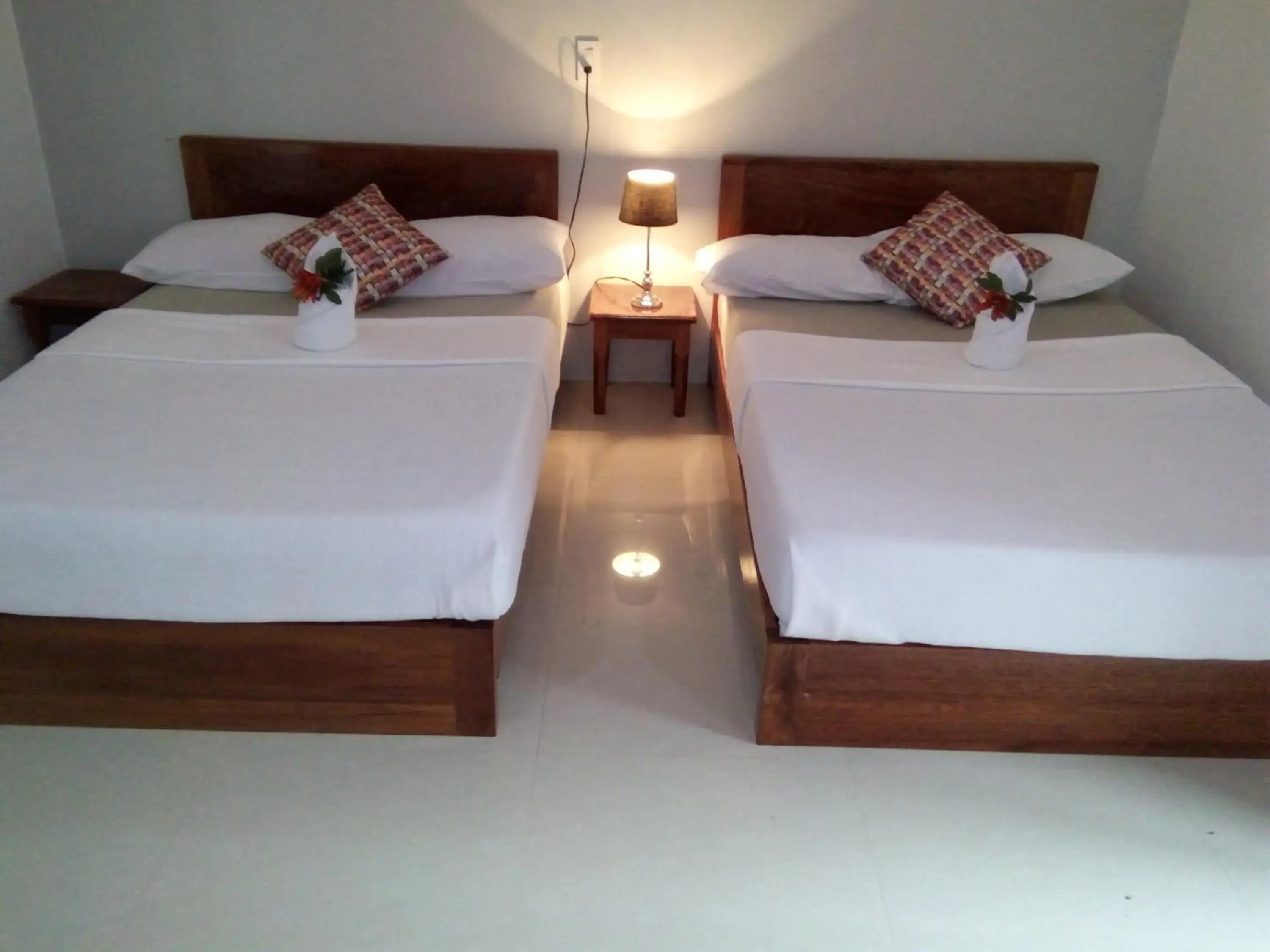 Bed in La Casa Teresa Tourist Inn Inc