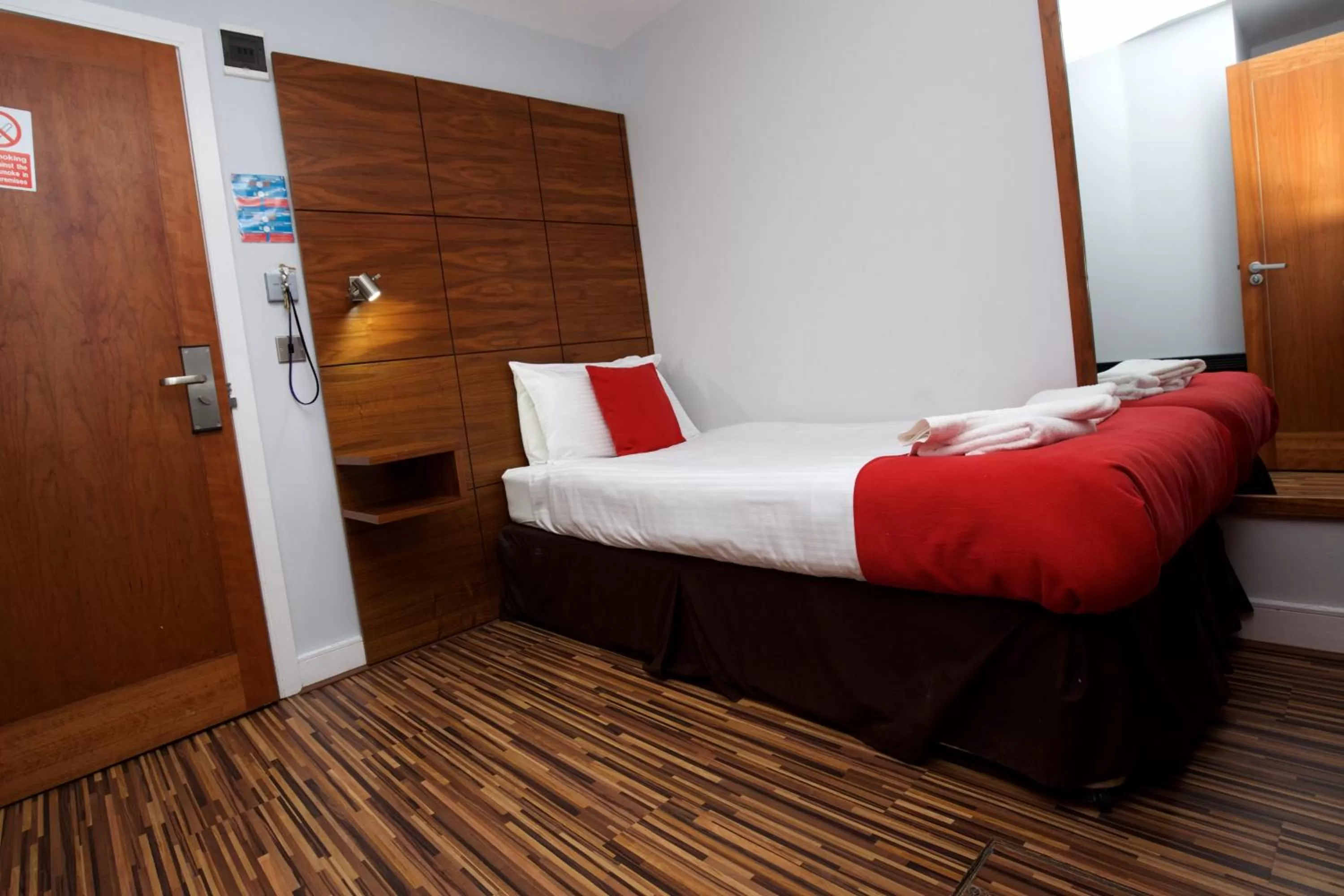 Bed in Cocoon @ International Inn + Apartments