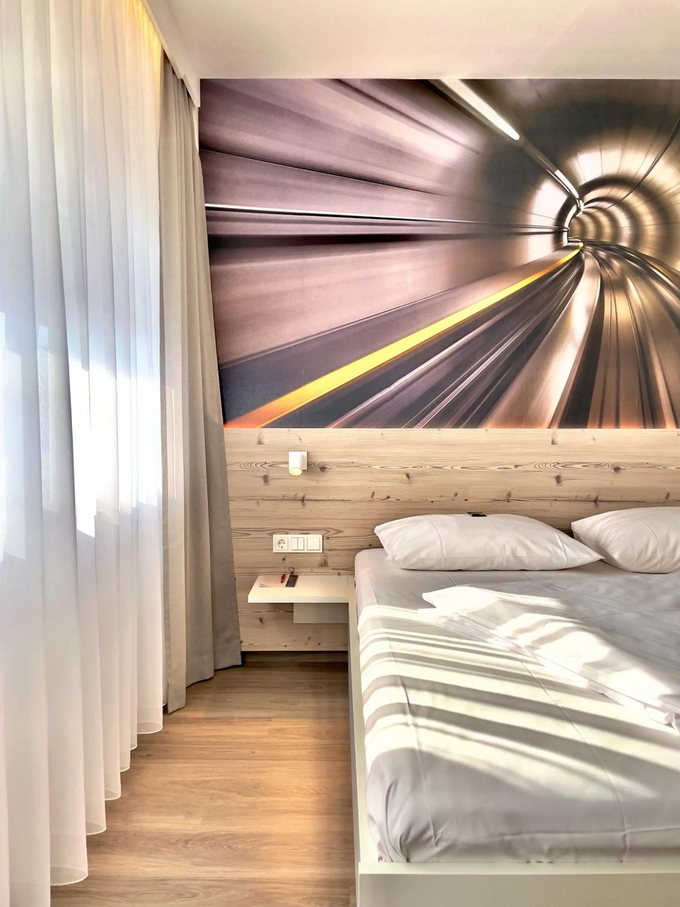 Bed in ART-Hotel Braun