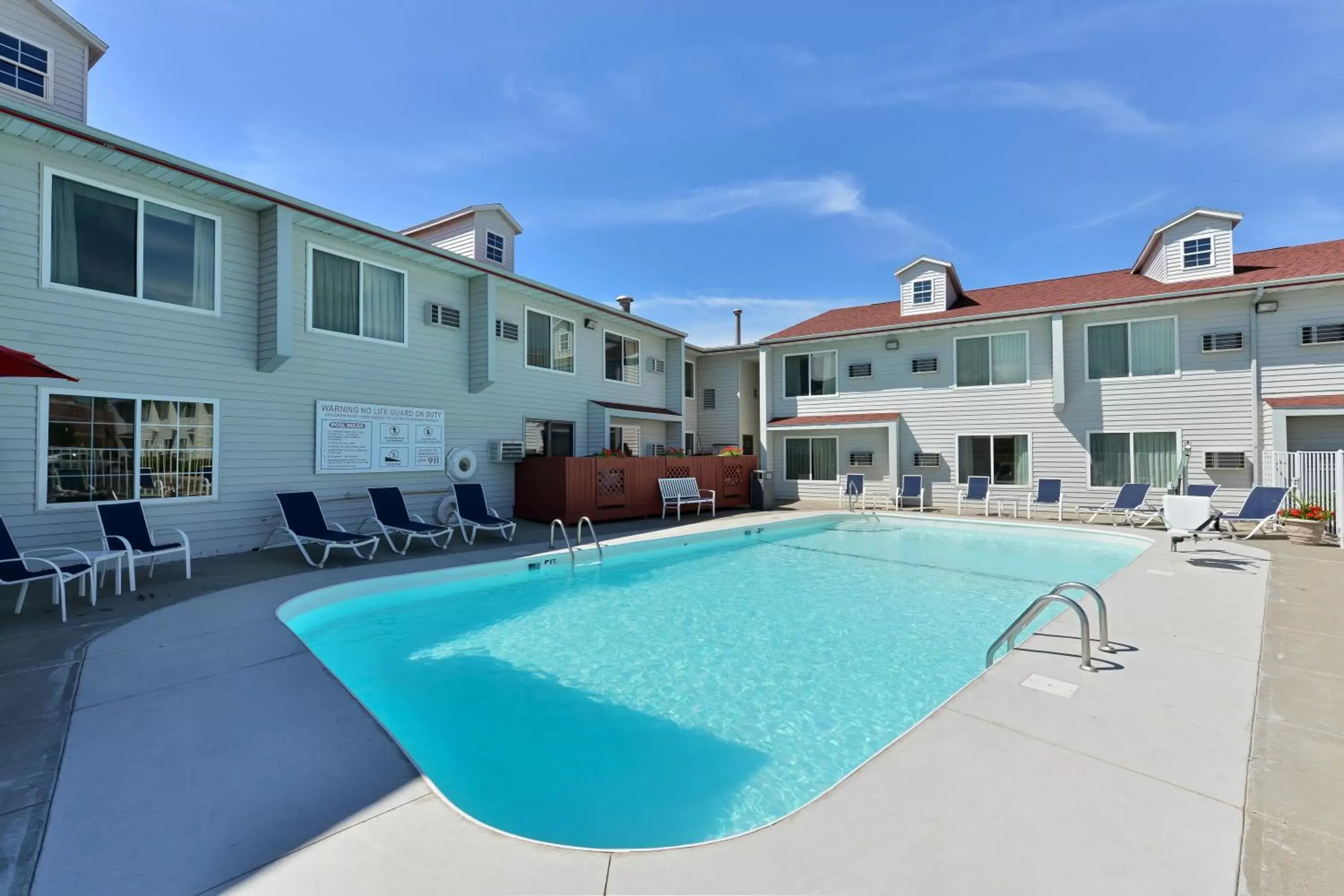Swimming pool, Property Building in Super 8 by Wyndham Rapid City