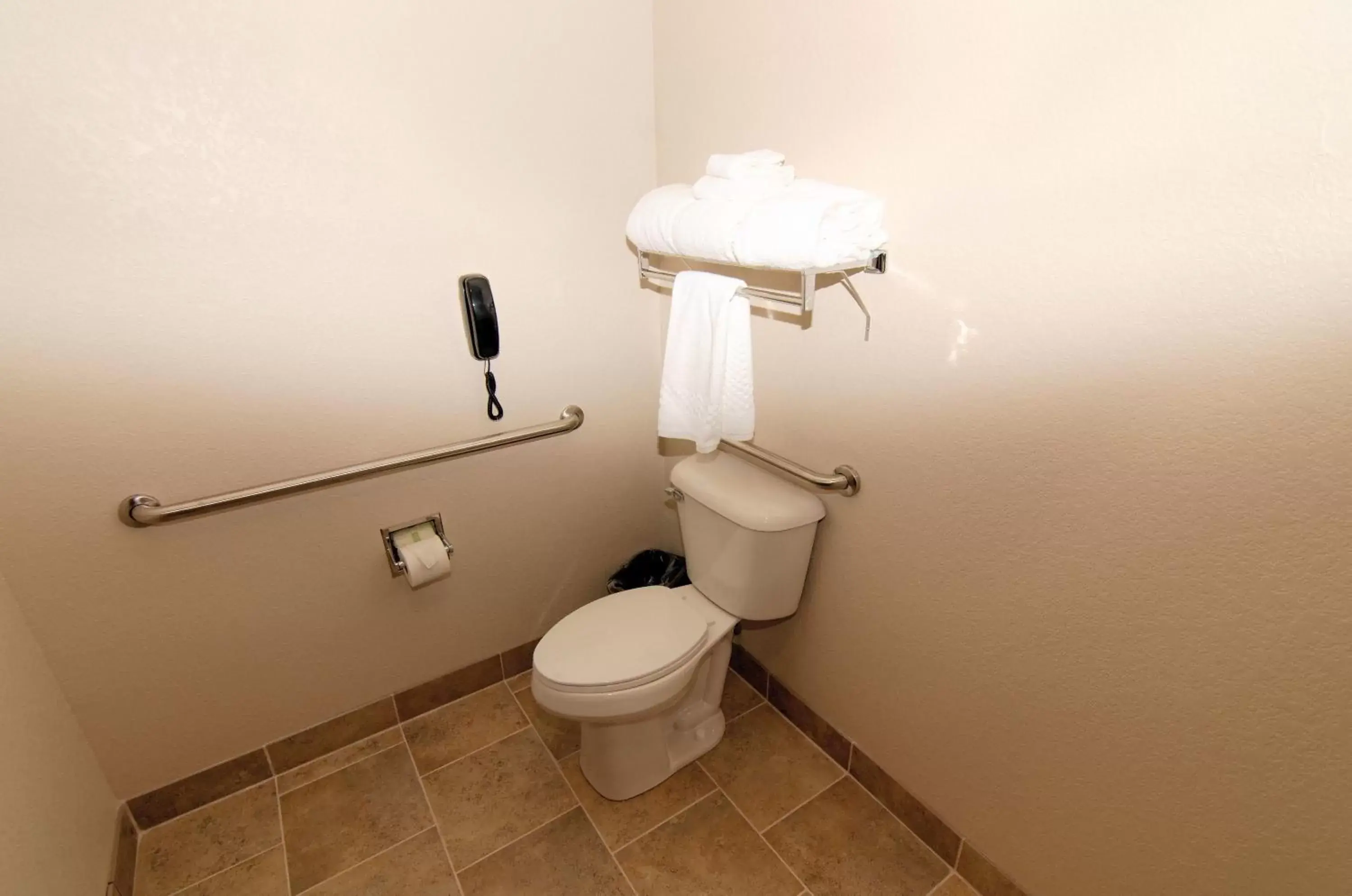 Toilet, Bathroom in Cobblestone Inn & Suites - Denison | Oak Ridge