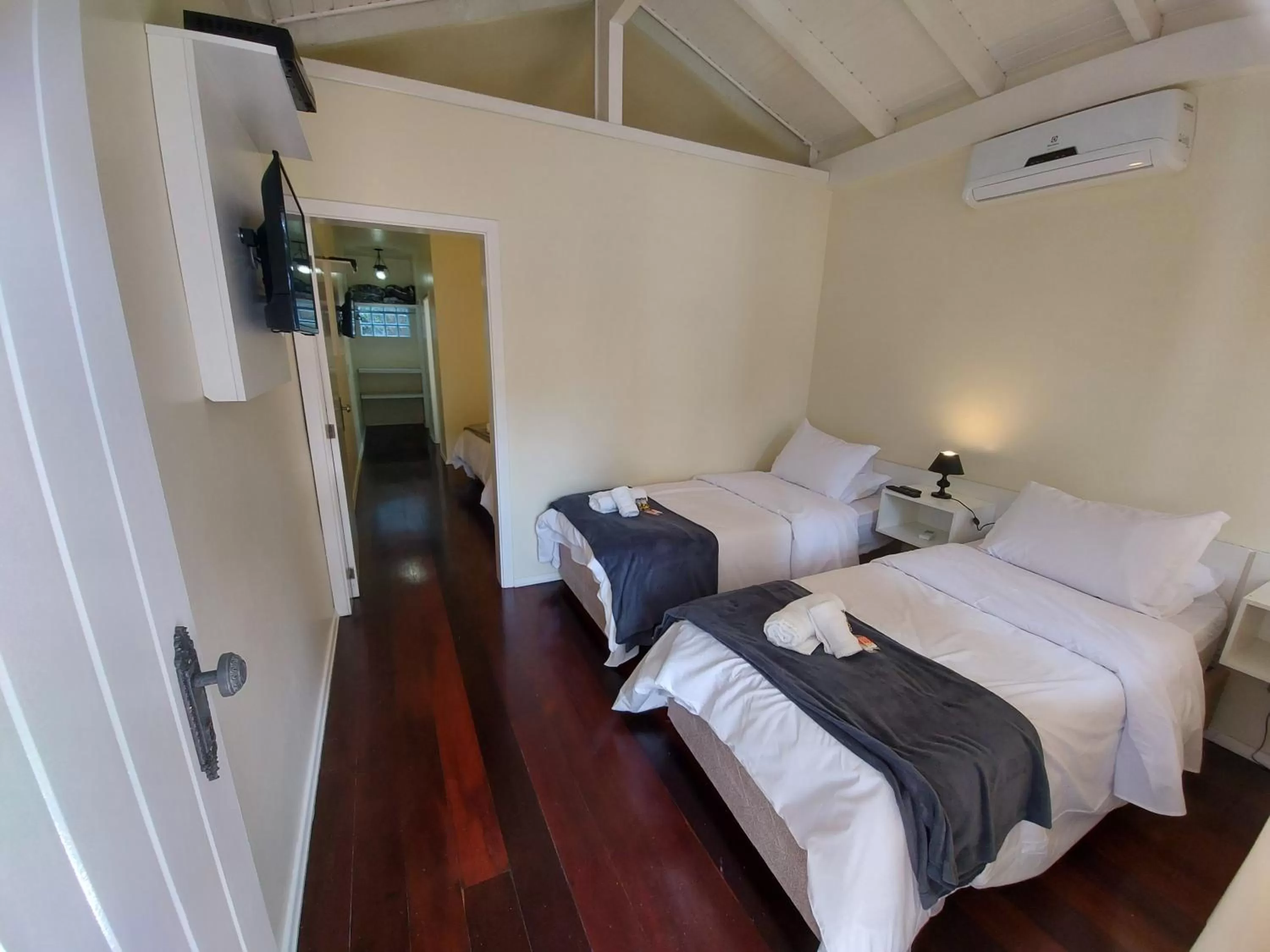 Bed in Pousada Lanai Canela