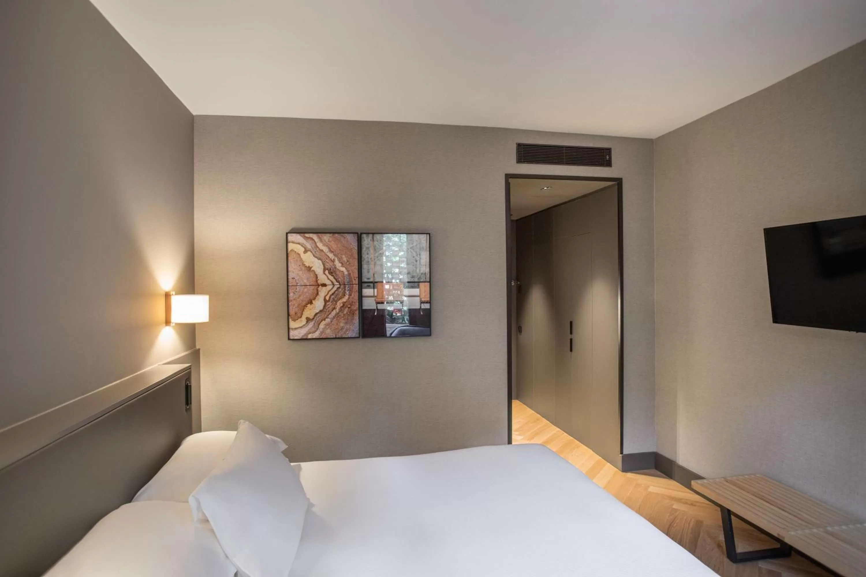 Bed in Alexandra Barcelona Hotel, Curio Collection by Hilton