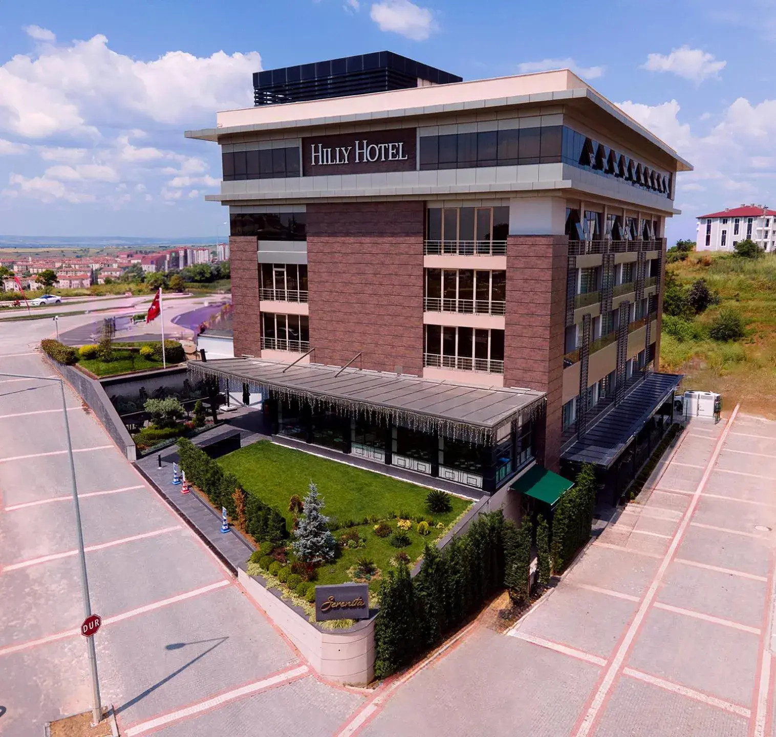 Property building in Hilly Hotel Property building in Hilly Hotel