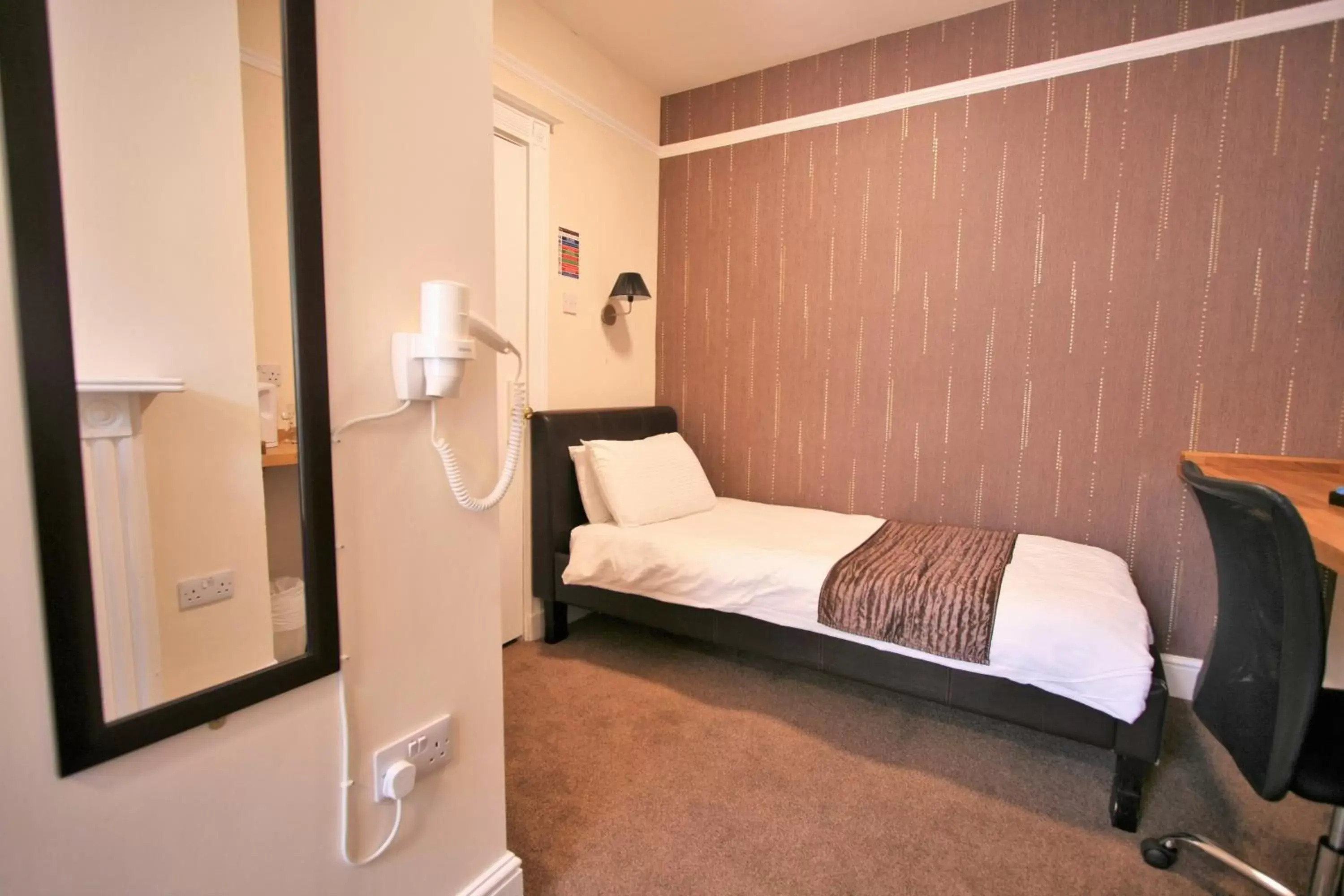 Bed in Central Hotel Cheltenham by Roomsbooked