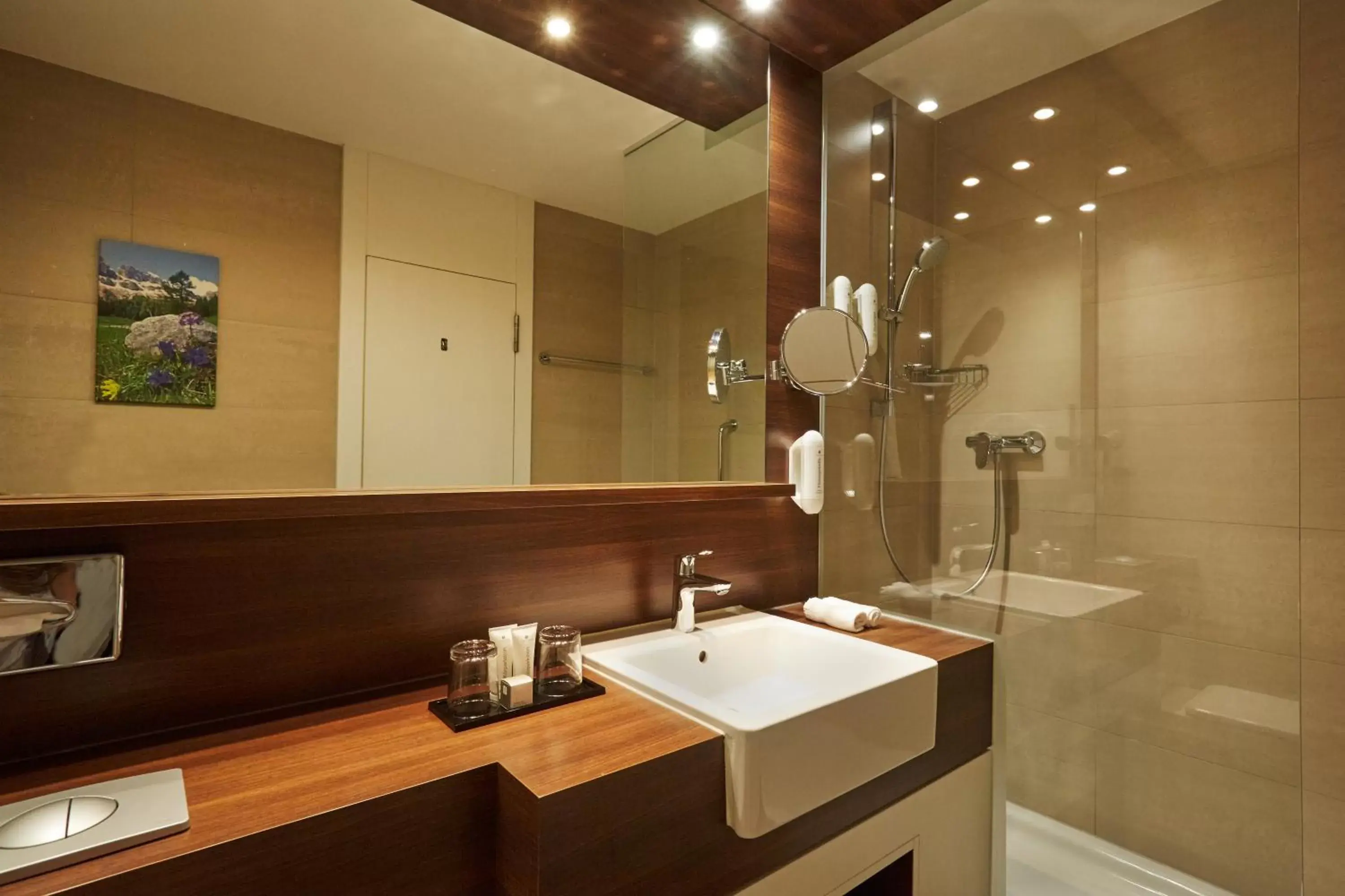 Bathroom in H+ Hotel & SPA Engelberg Bathroom in H+ Hotel & SPA Engelberg