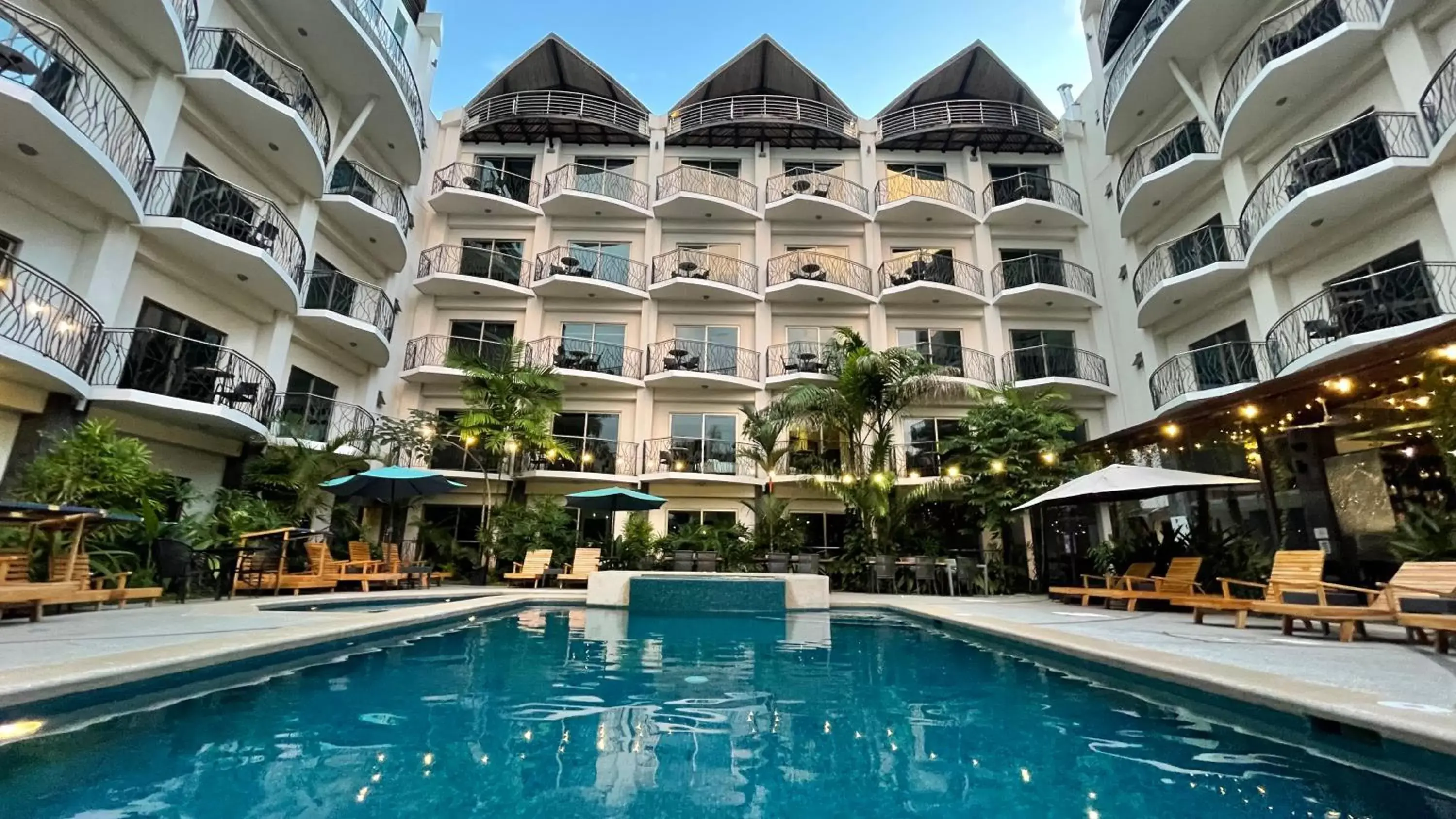 Property building, Swimming Pool in PACIFIC SUITES Boutique Hotel and Bistro