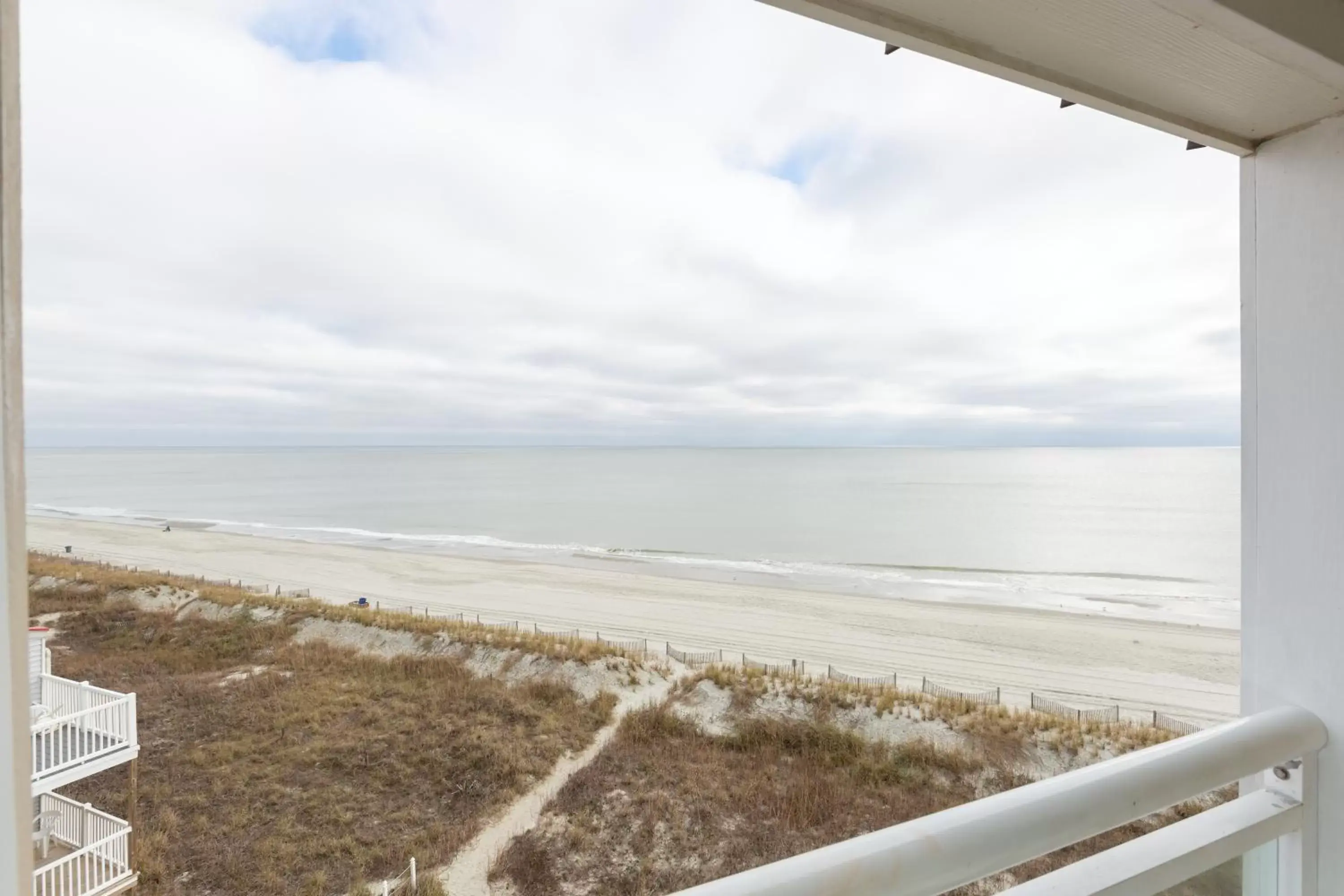 Balcony/Terrace, Sea View in A Place at the Beach by Capital Vacations