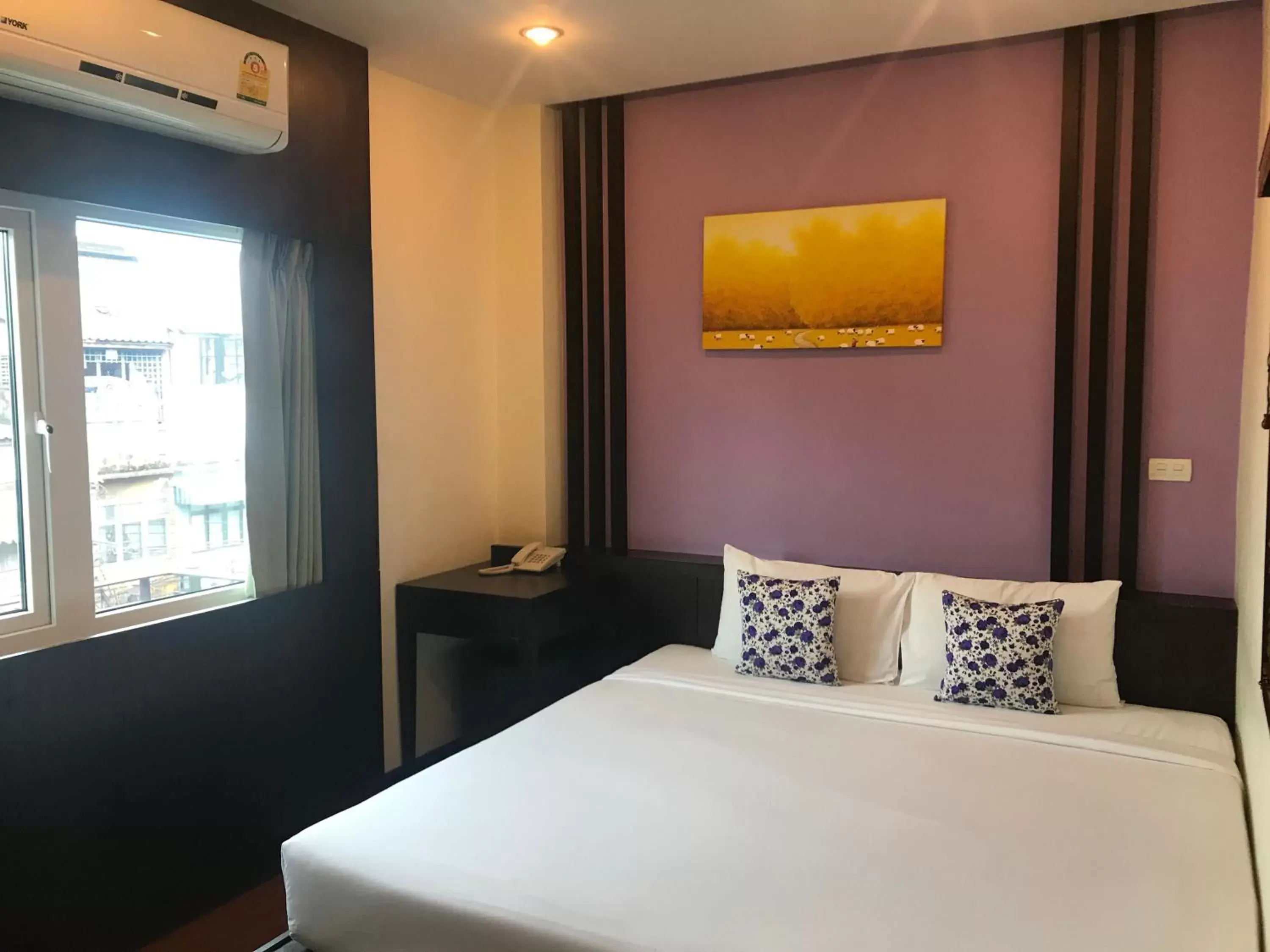 Bedroom in Tara Place Hotel Bangkok