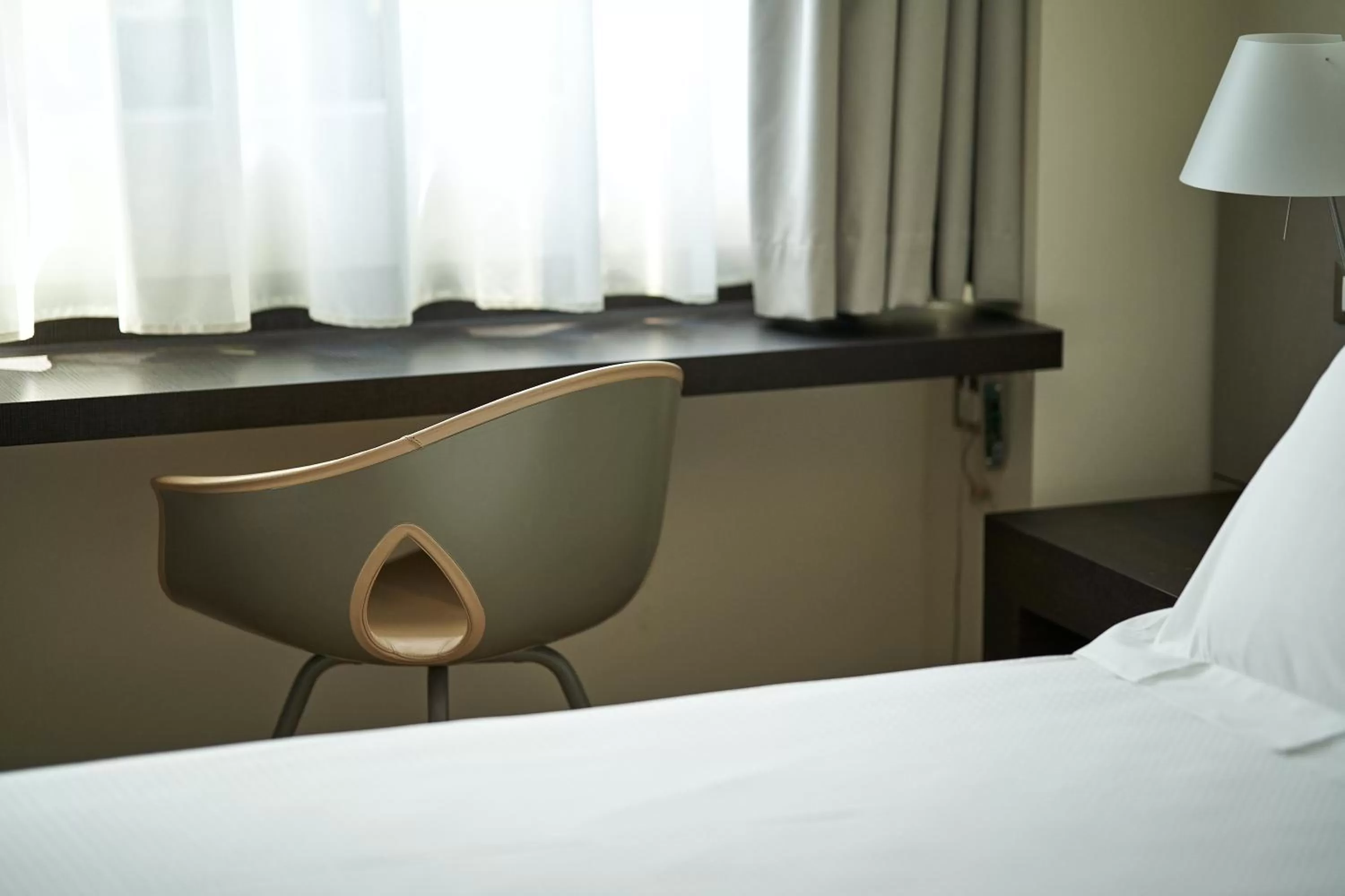 Bedroom, Bed in UNA Hotels Bologna Fiera