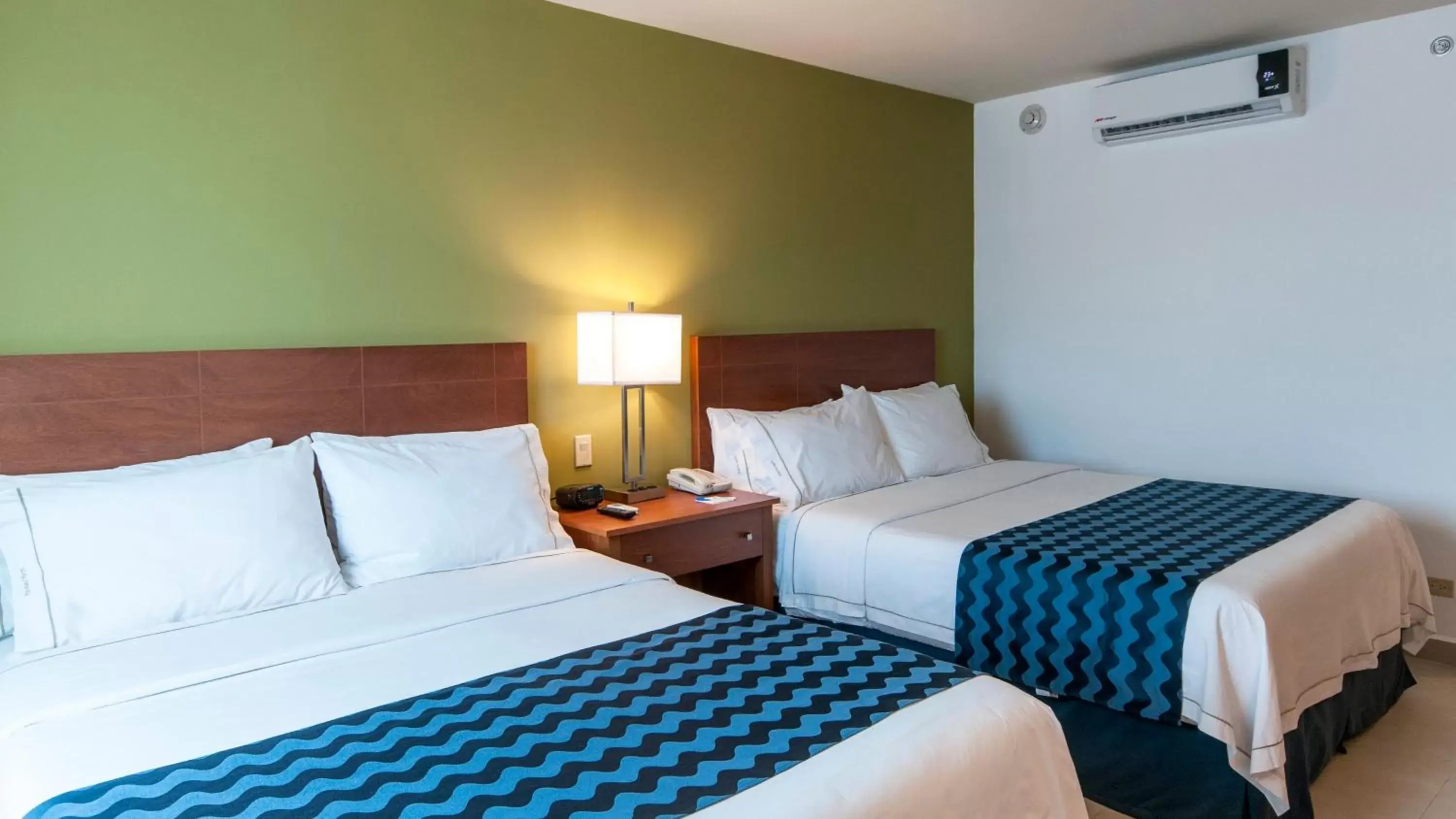 Photo of the whole room, Bed in Holiday Inn Express Cabo San Lucas by IHG Photo of the whole room, Bed in Holiday Inn Express Cabo San Lucas by IHG