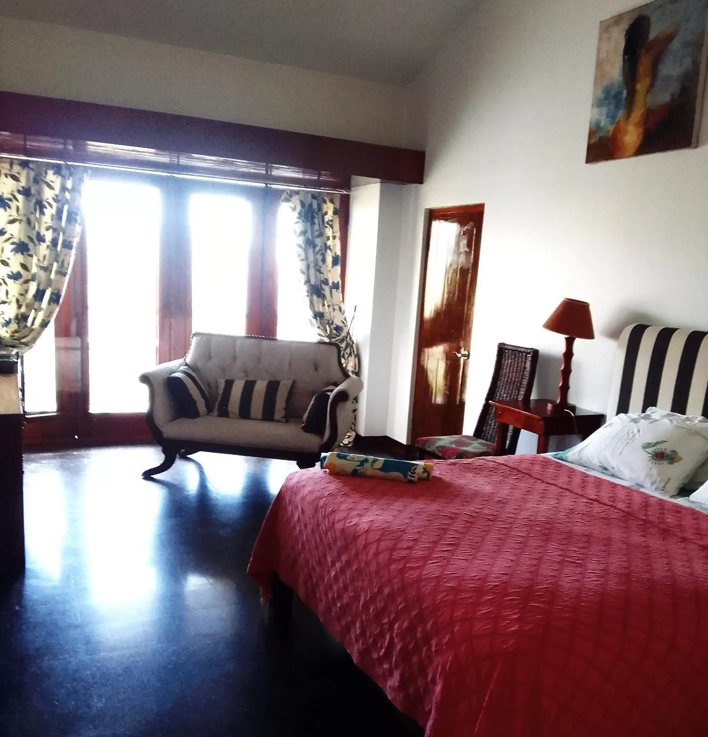 Bed, Seating Area in Tranquility Estate