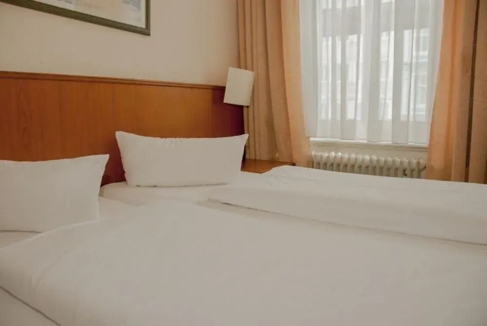 Bed in Hotel Terminus am Hauptbahnhof & ZOB Bed in Hotel Terminus am Hauptbahnhof & ZOB