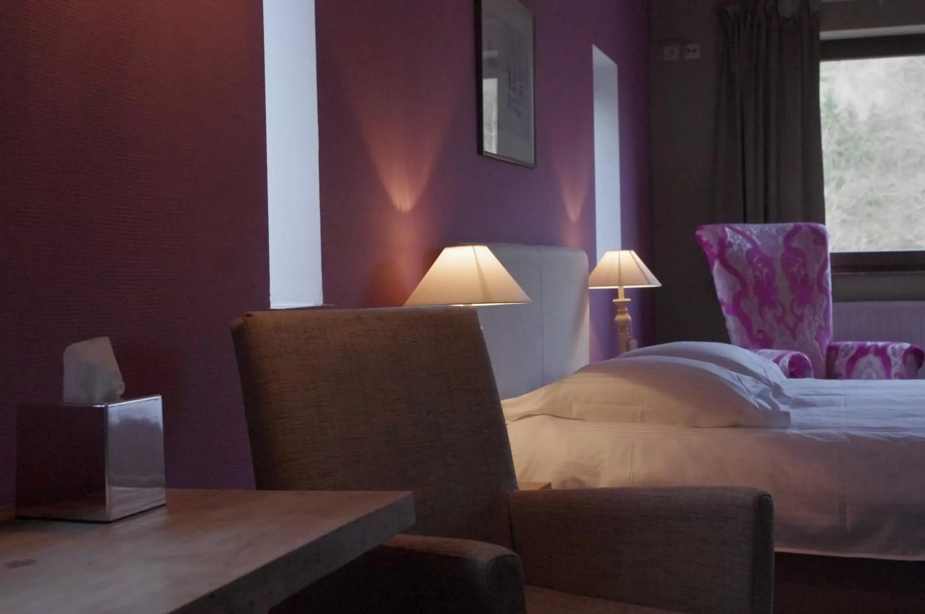 Bed, Seating Area in Logis Hostellerie De La Claire Fontaine