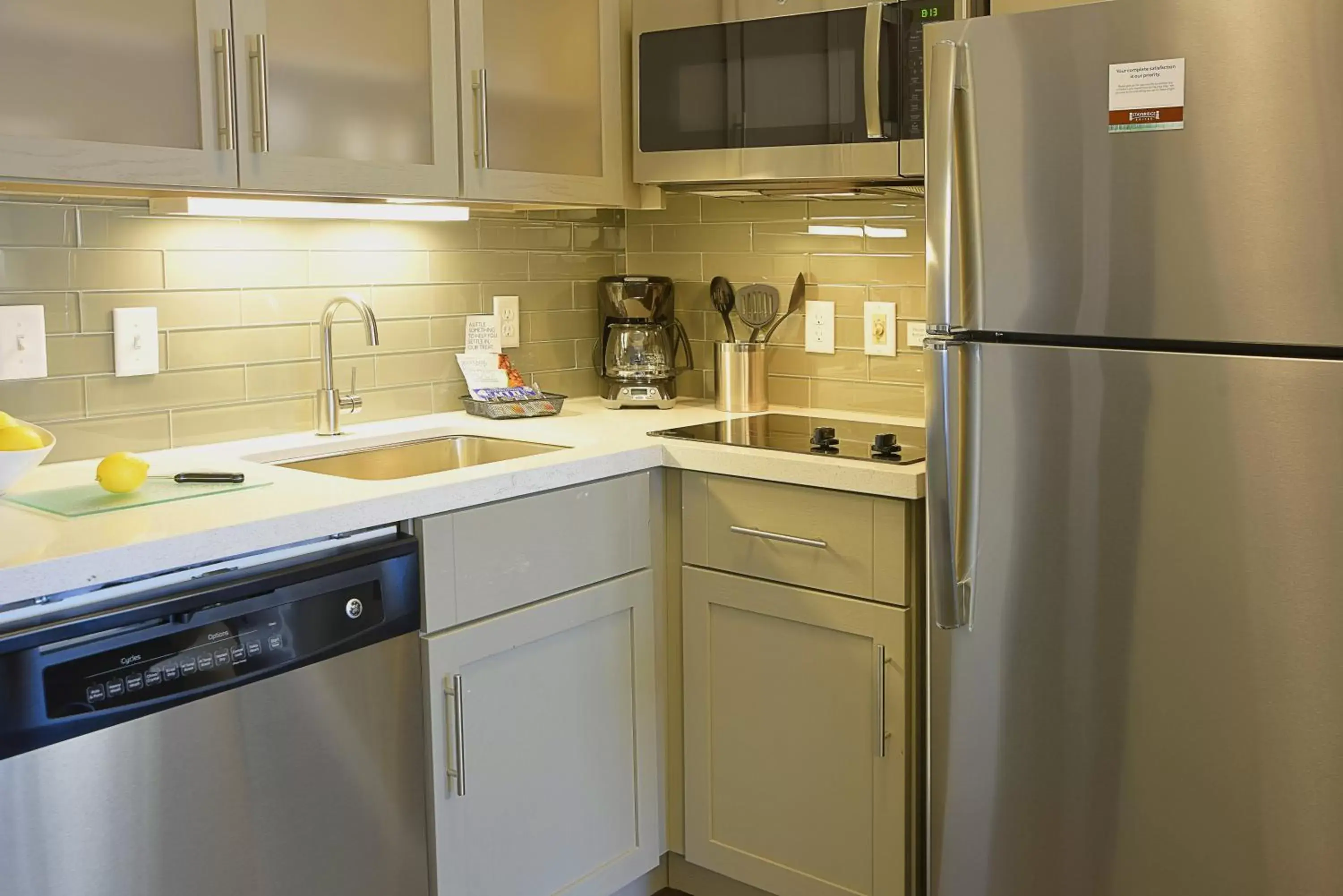 Photo of the whole room, Kitchen/Kitchenette in Staybridge Suites - Little Rock - Medical Center, an IHG Hotel