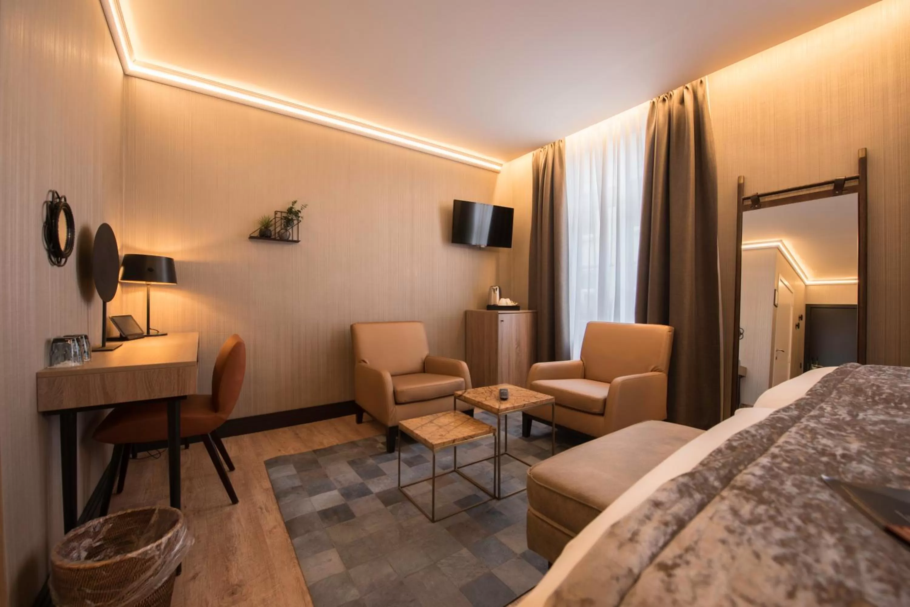 Seating area, Bed in Hotel Acacia