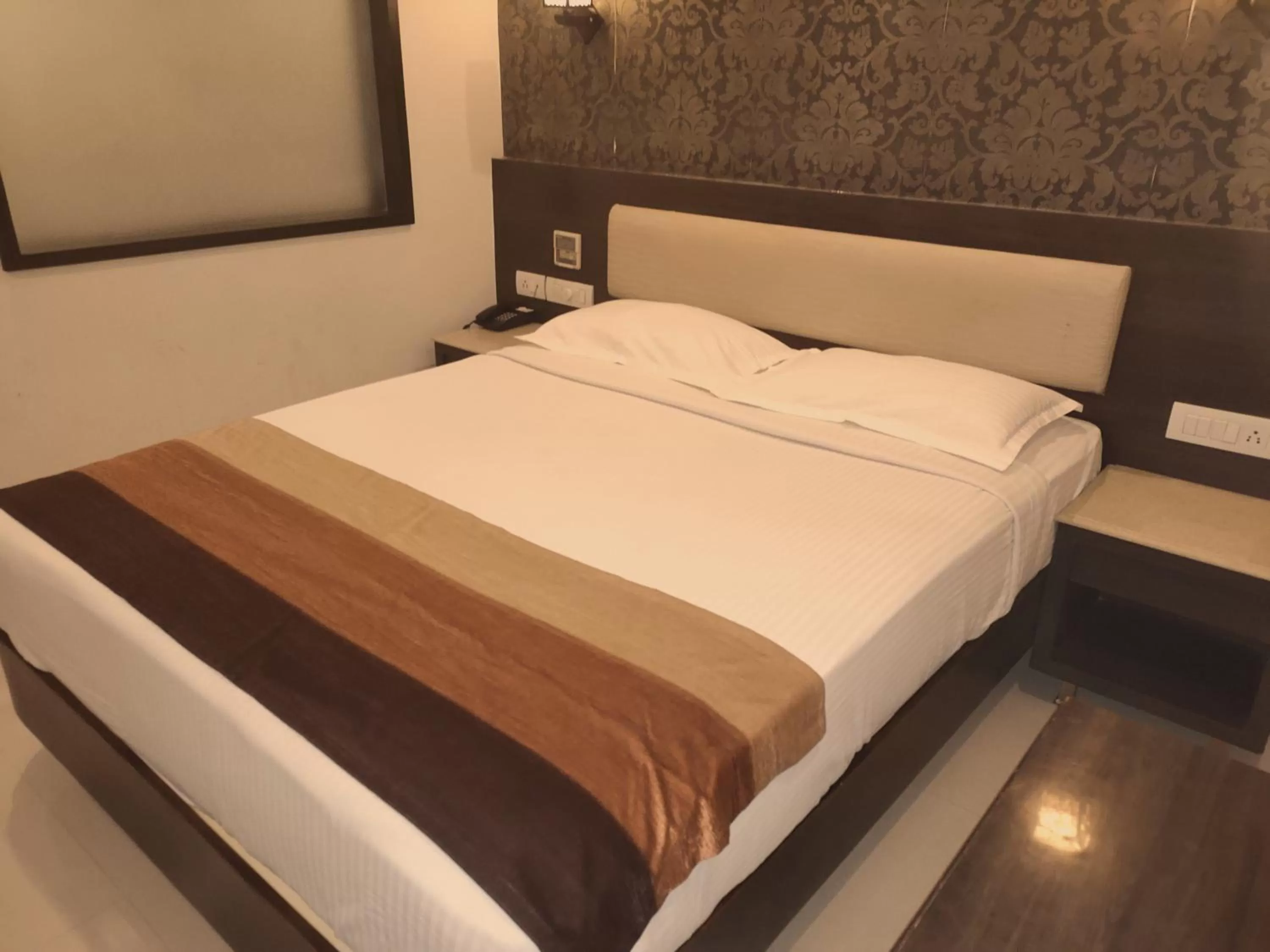 Bed in Hotel Deepam