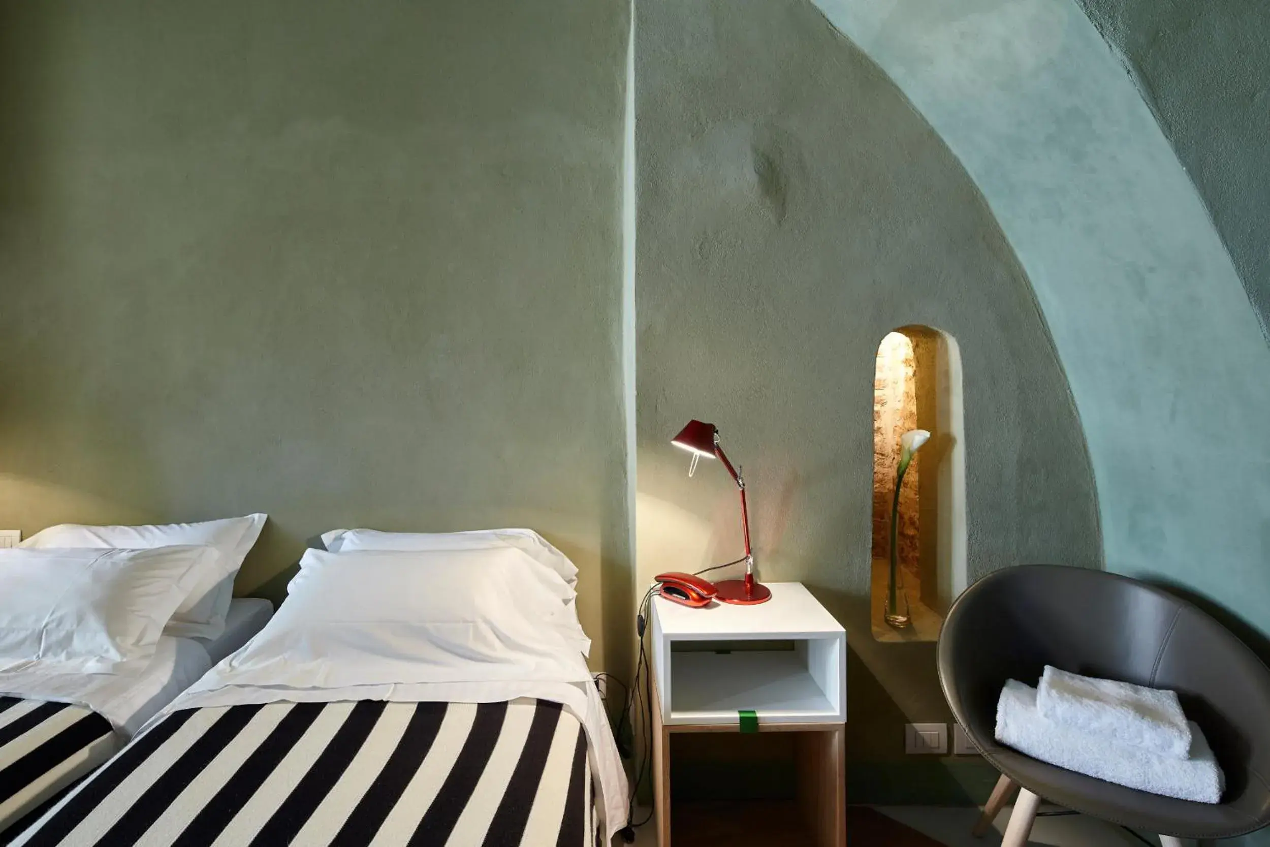 Bed in Palazzetto Rosso - Art Hotel