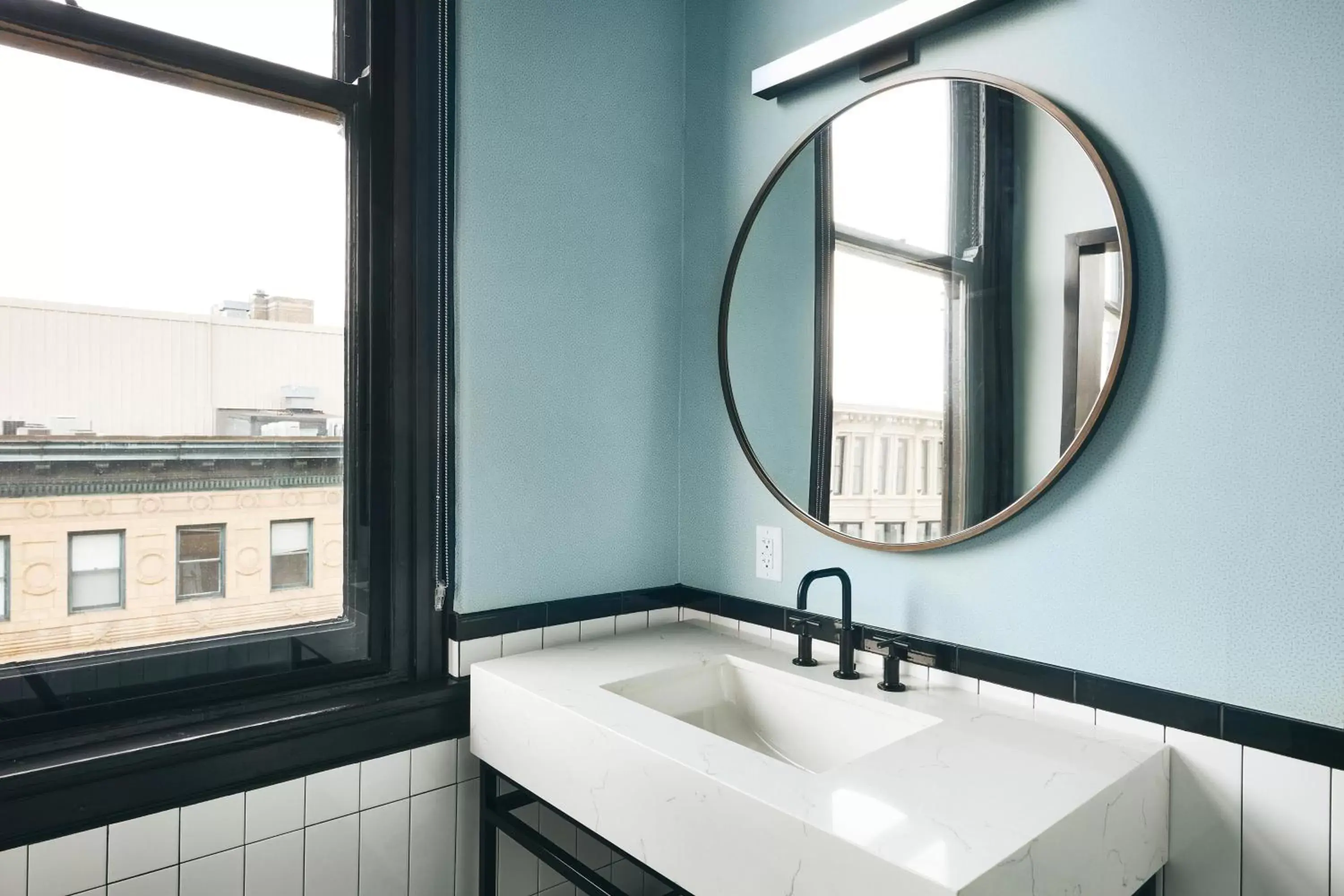 Bathroom in Kinley Cincinnati Downtown, a Tribute Portfolio Hotel